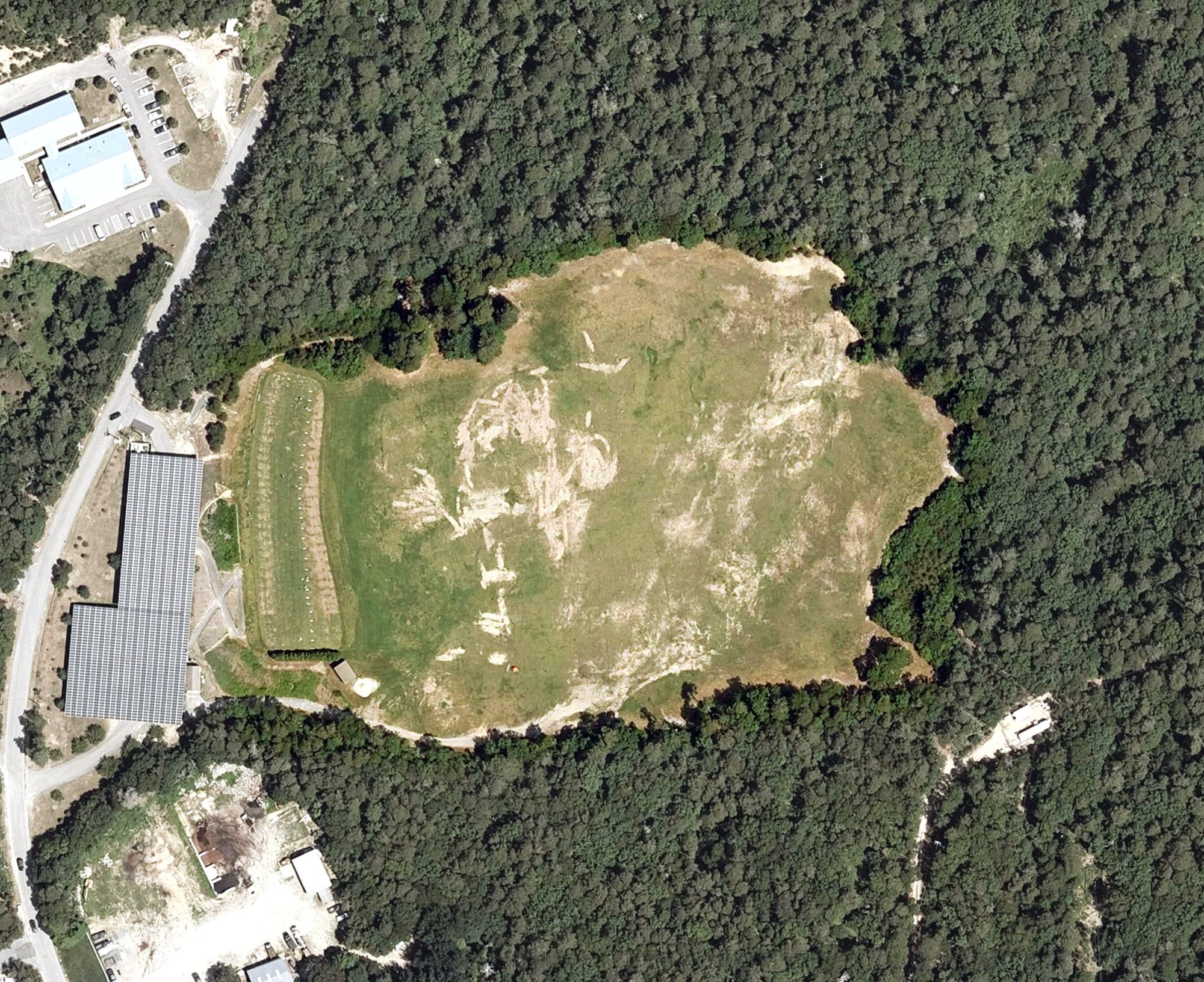 Aerial view of Captain's Driving Range, MA, with its hole routing marked