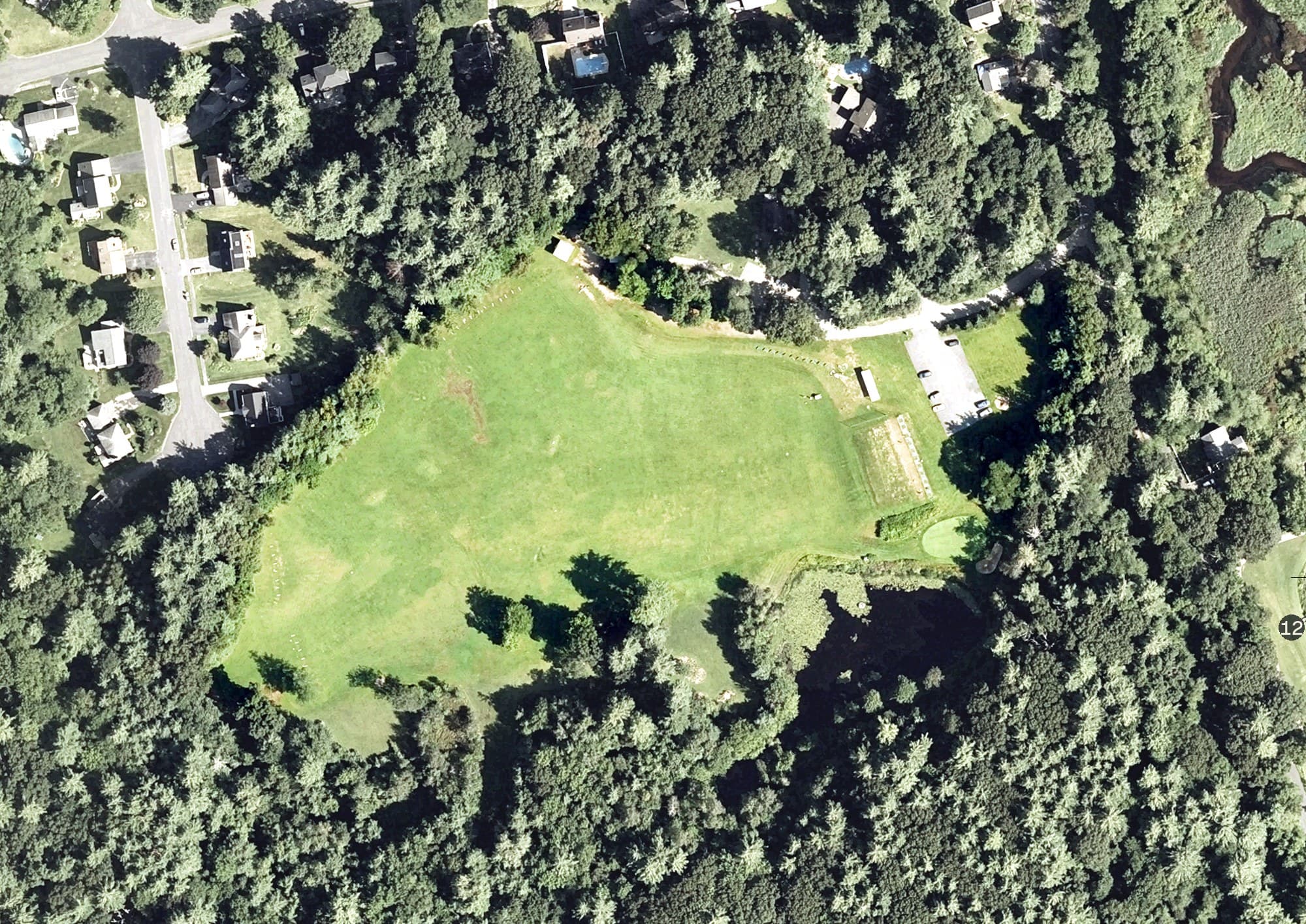 Aerial view of Juniper Hill - Golf Teaching Center, MA, with its hole routing marked