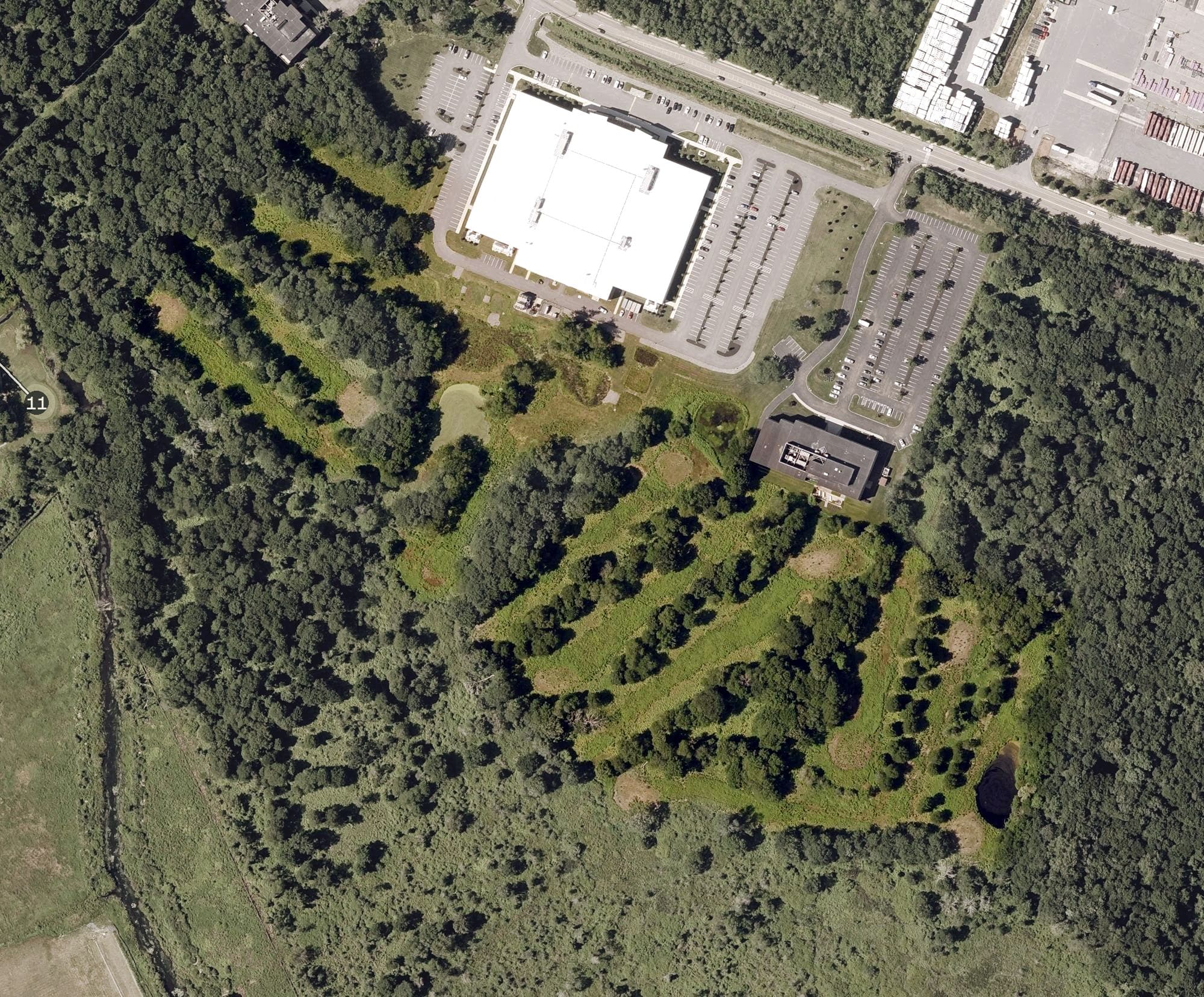 Aerial view of Lost Brook Golf Course, MA, with its hole routing marked