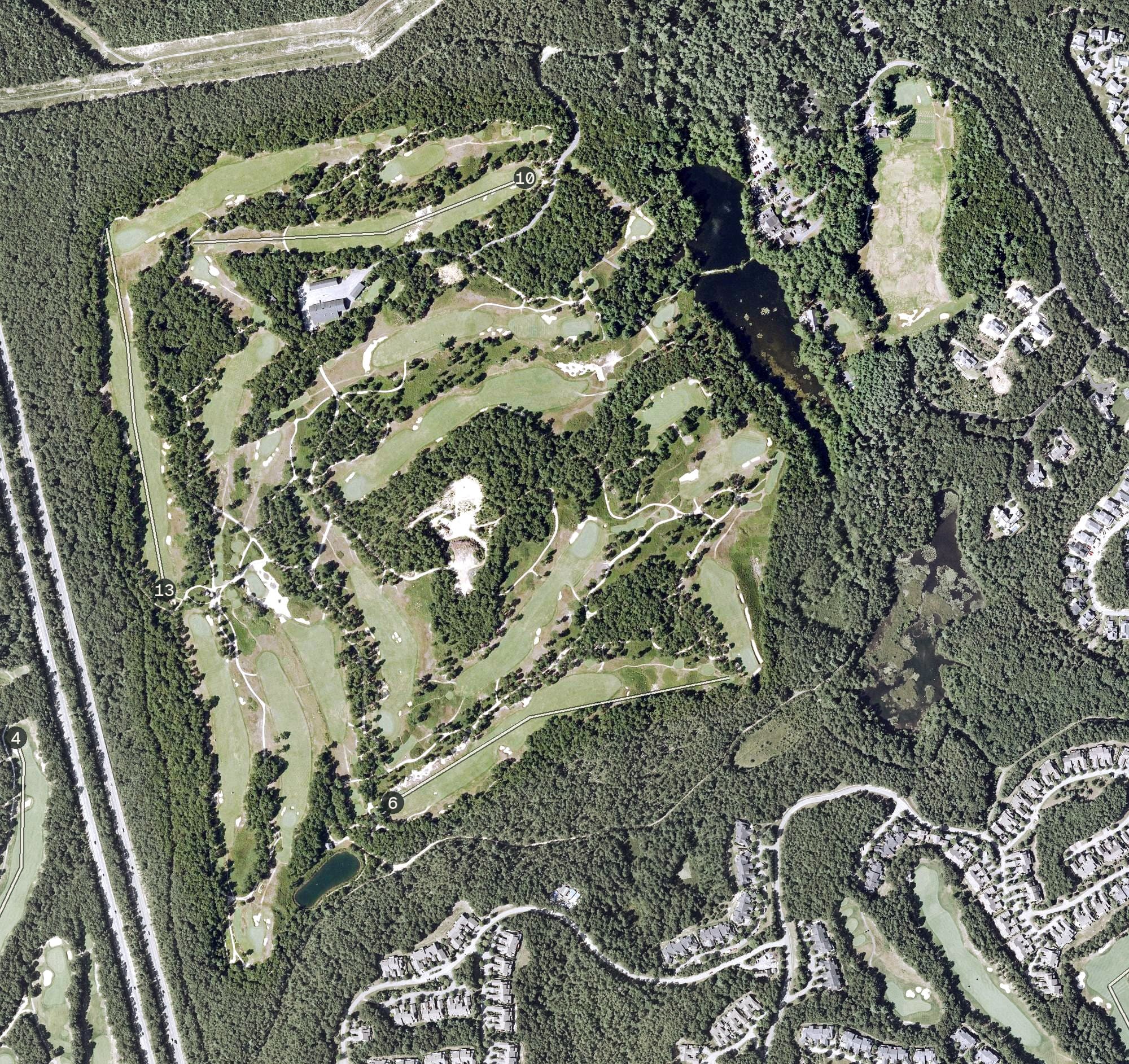 Aerial view of Old Sandwich Golf Club, MA, with its hole routing marked