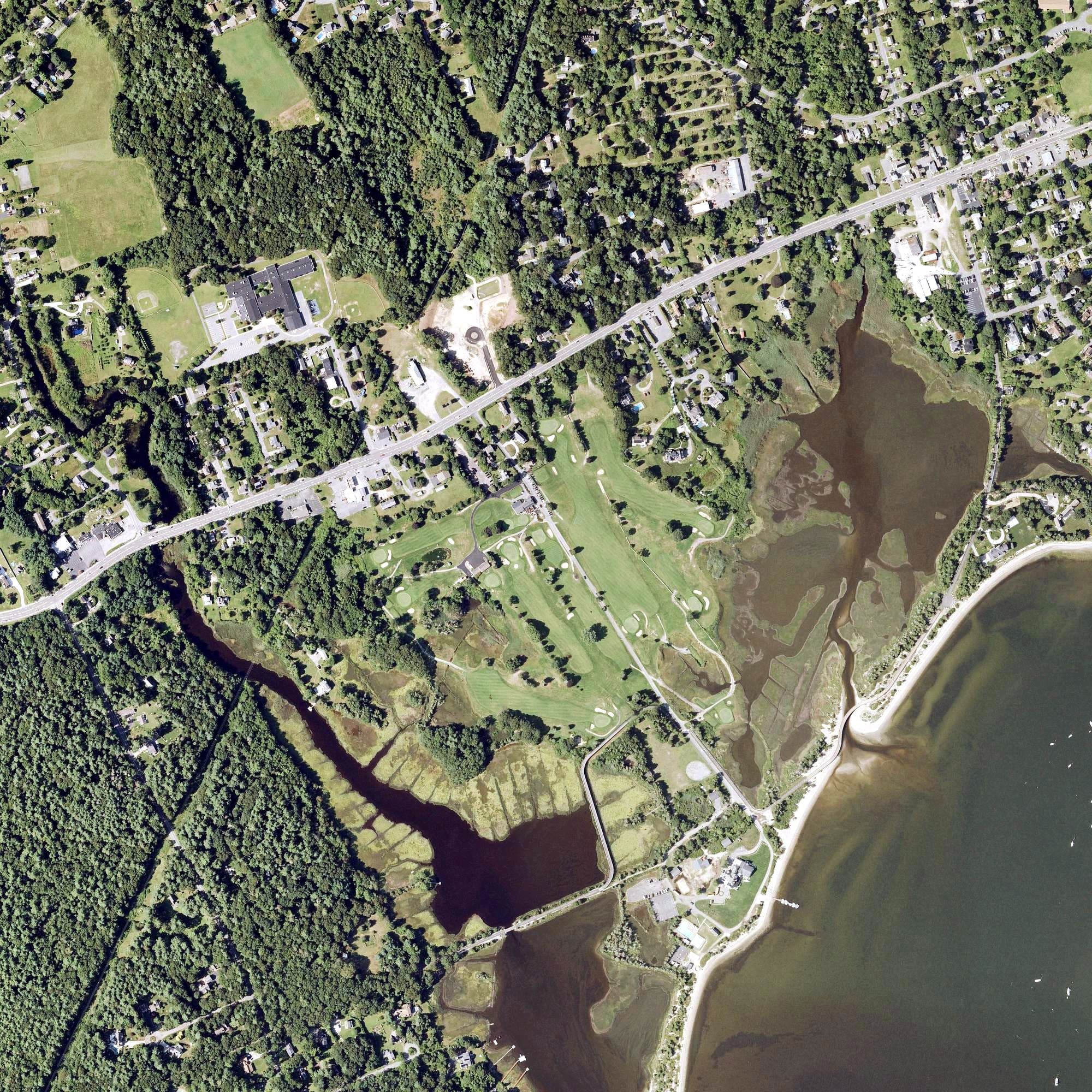 Aerial view of Reservation Golf Club, MA, with its hole routing marked