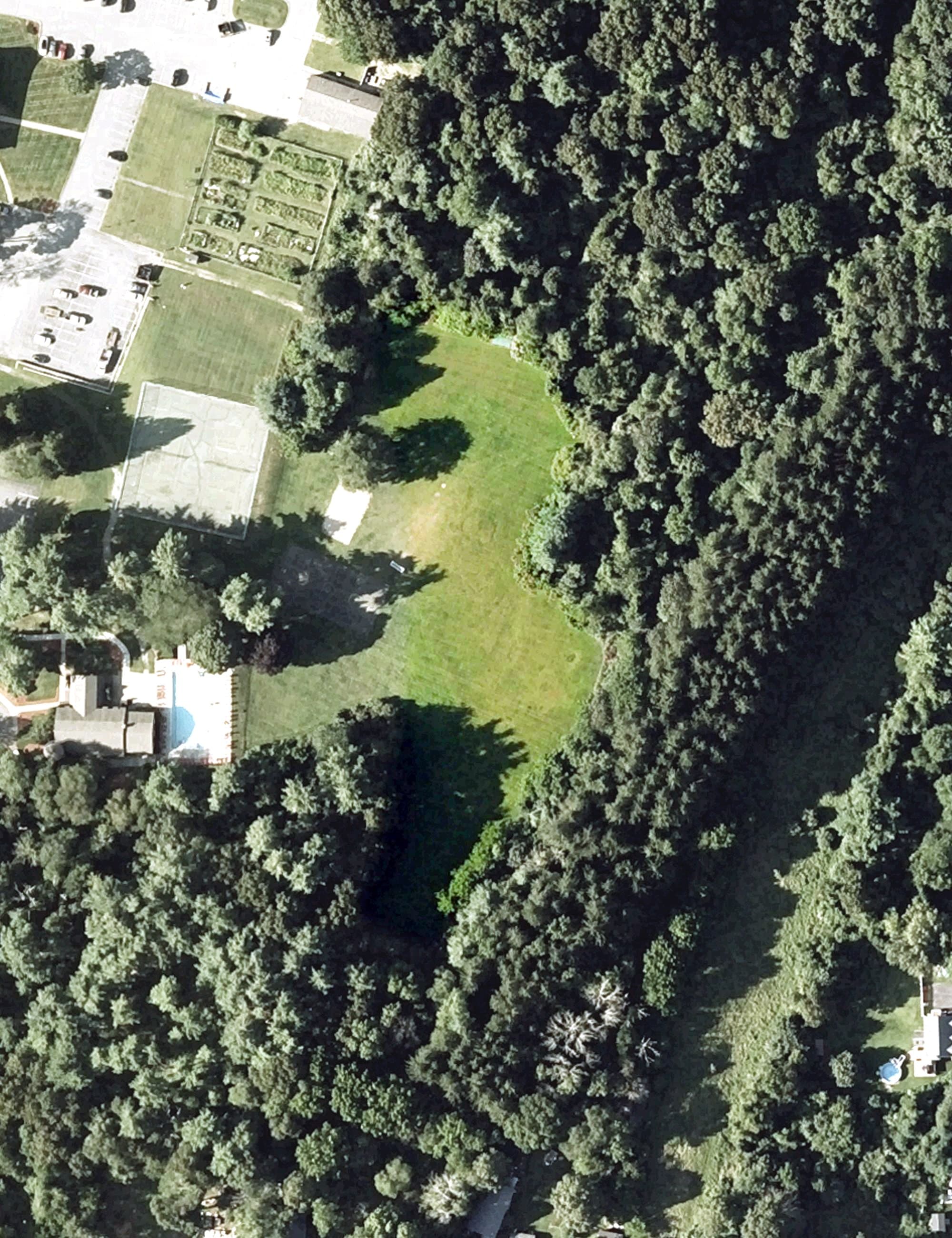 Aerial view of Waterford Village Driving Range, MA, with its hole routing marked