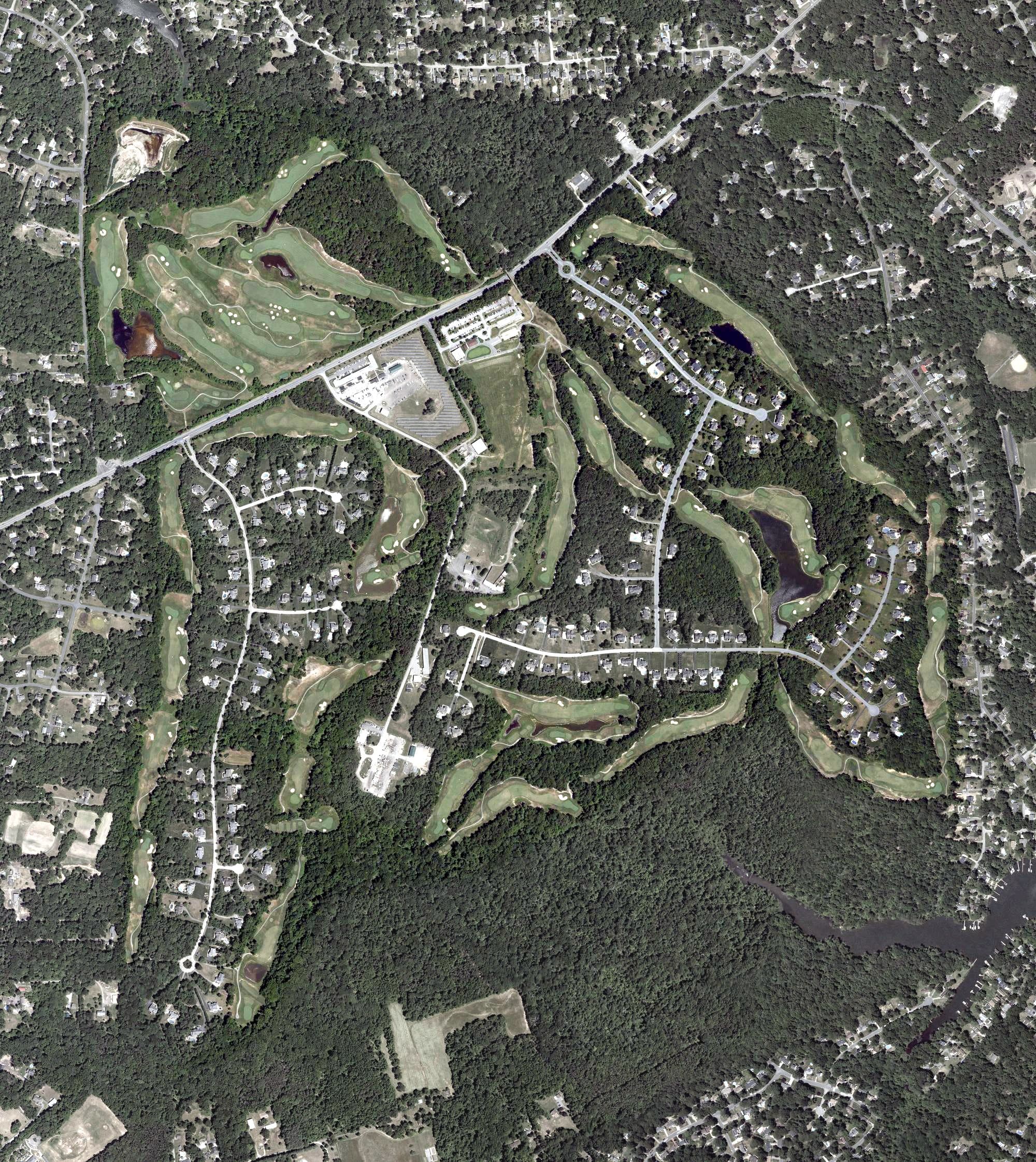 Aerial view of Compass Point Golf Course, MD, with its hole routing marked