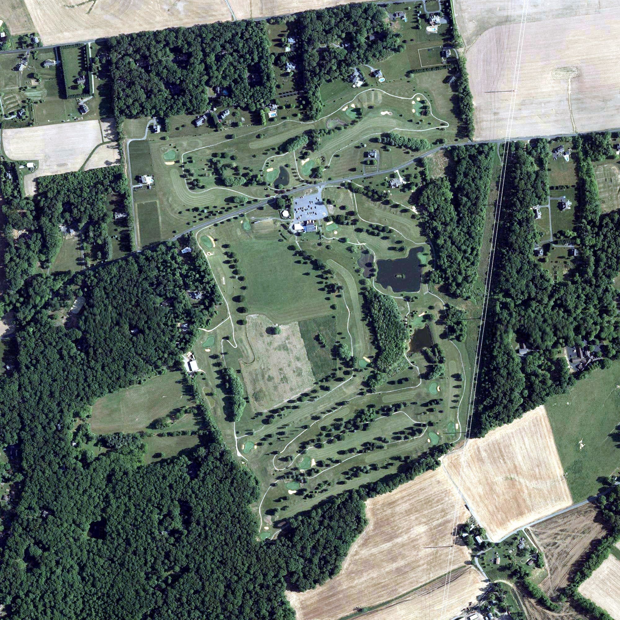 Aerial view of Geneva Farm Golf Course, MD, with its hole routing marked