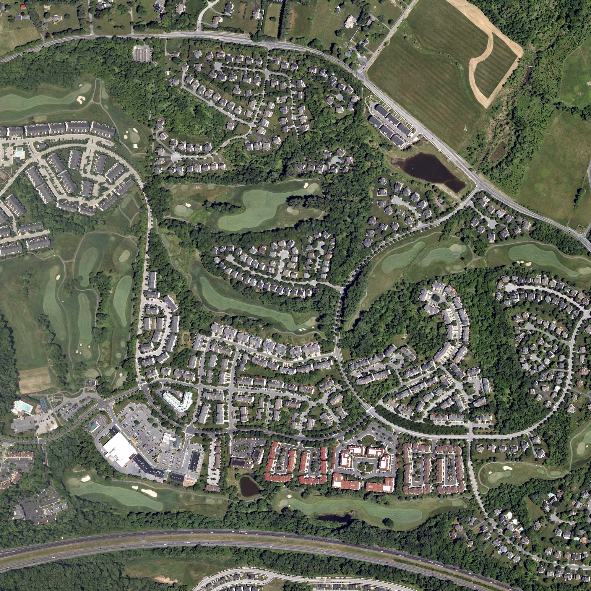 Aerial view of Waverly Woods Golf Course, MD, with its hole routing marked