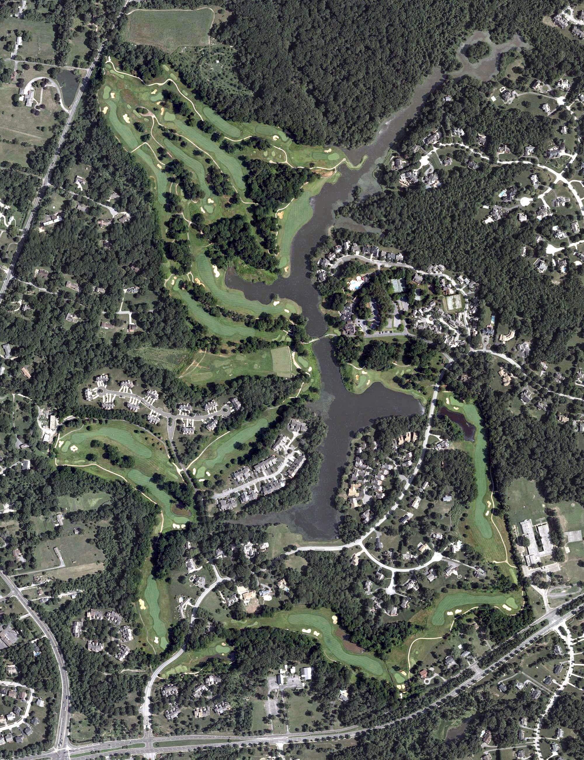 Aerial view of Woodmere Golf Club, MD, with its hole routing marked