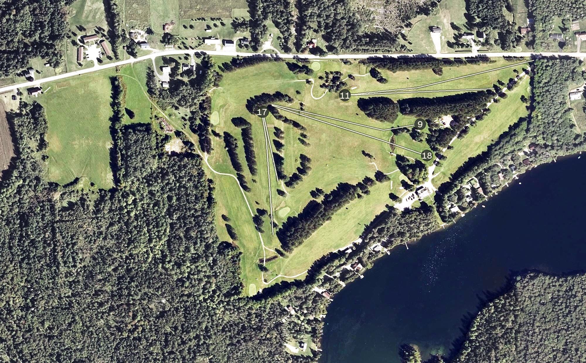 Aerial view of Houlton Community Golf Club, ME, with its hole routing marked