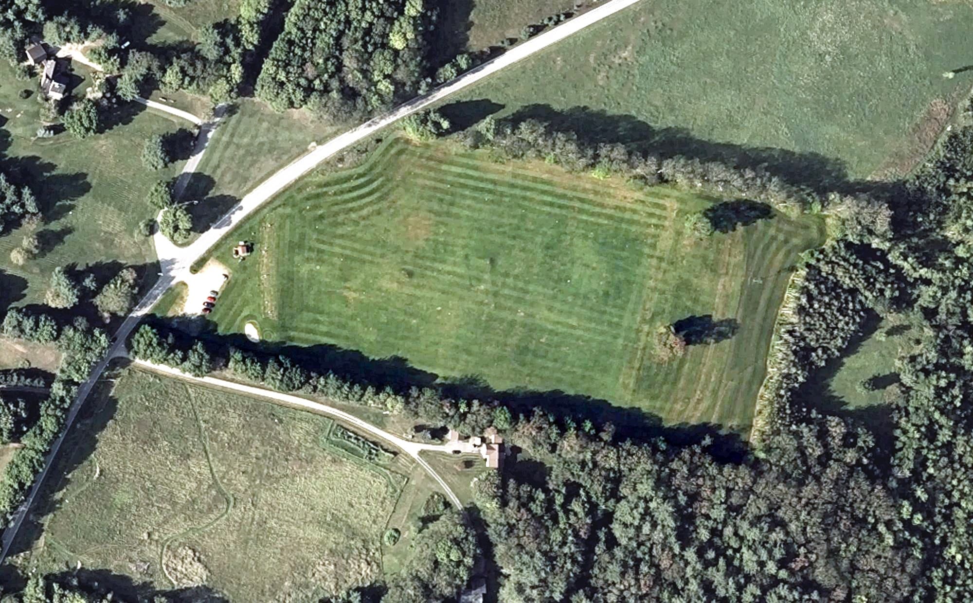 Aerial view of Natanis Driving Range, ME, with its hole routing marked