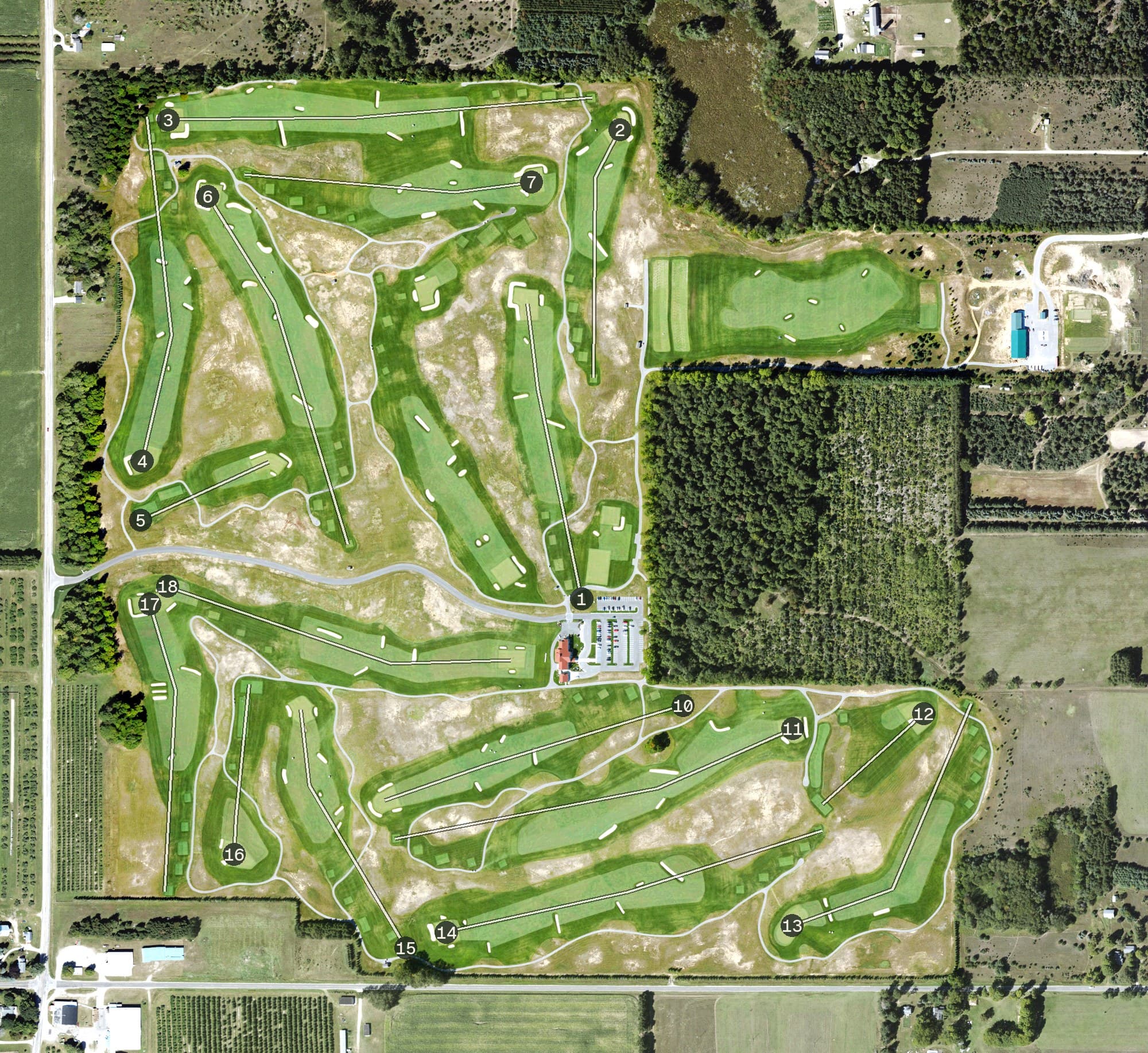 Aerial view of Arcadia Bluffs - South Course, MI, with its hole routing marked