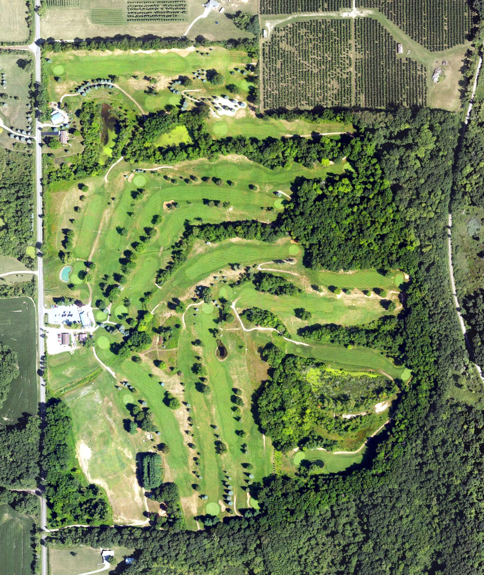 Aerial view of Arrowhead Golf Club, MI, with its hole routing marked