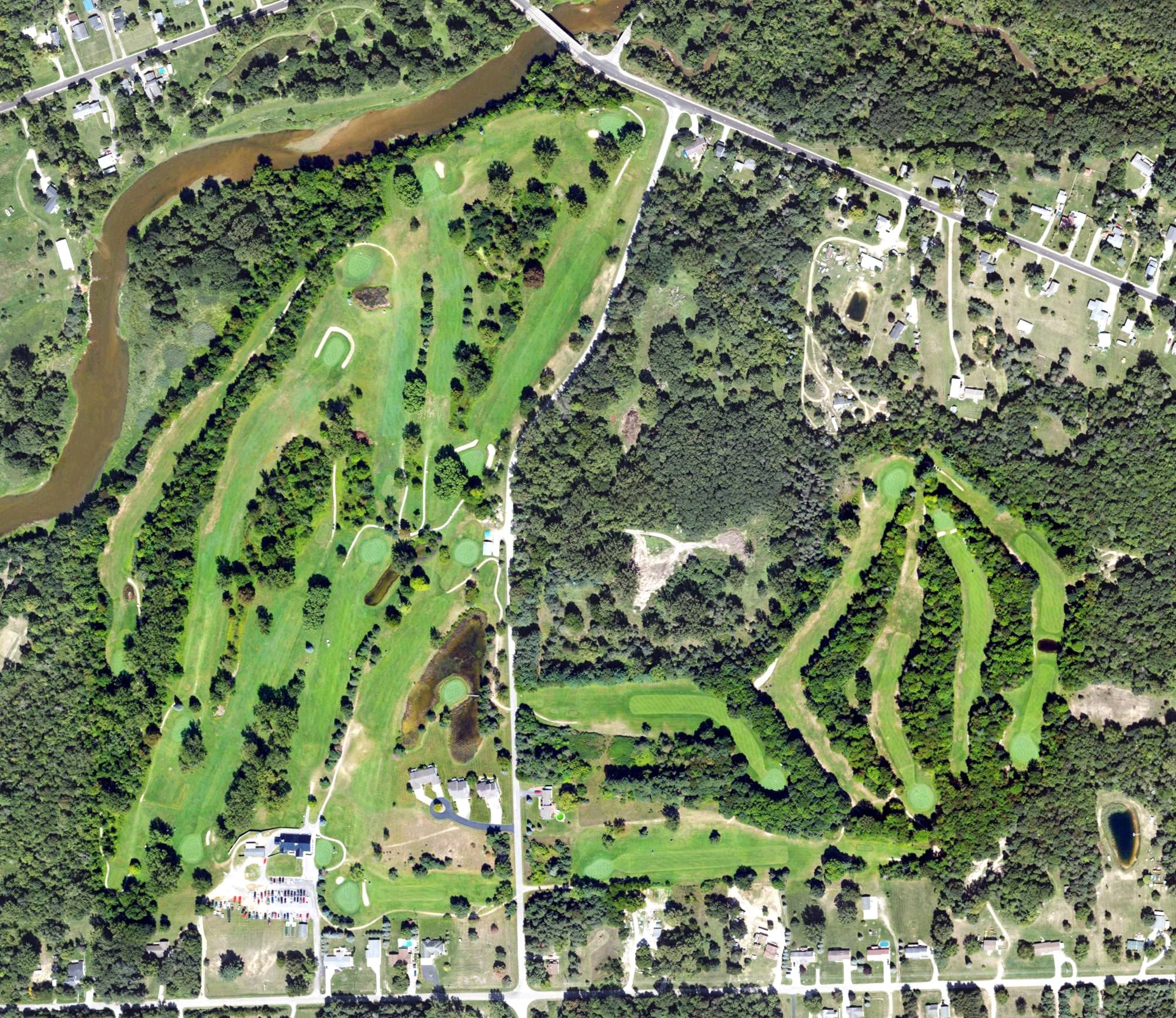 Aerial view of Arrowhead Golf Club, MI, with its hole routing marked