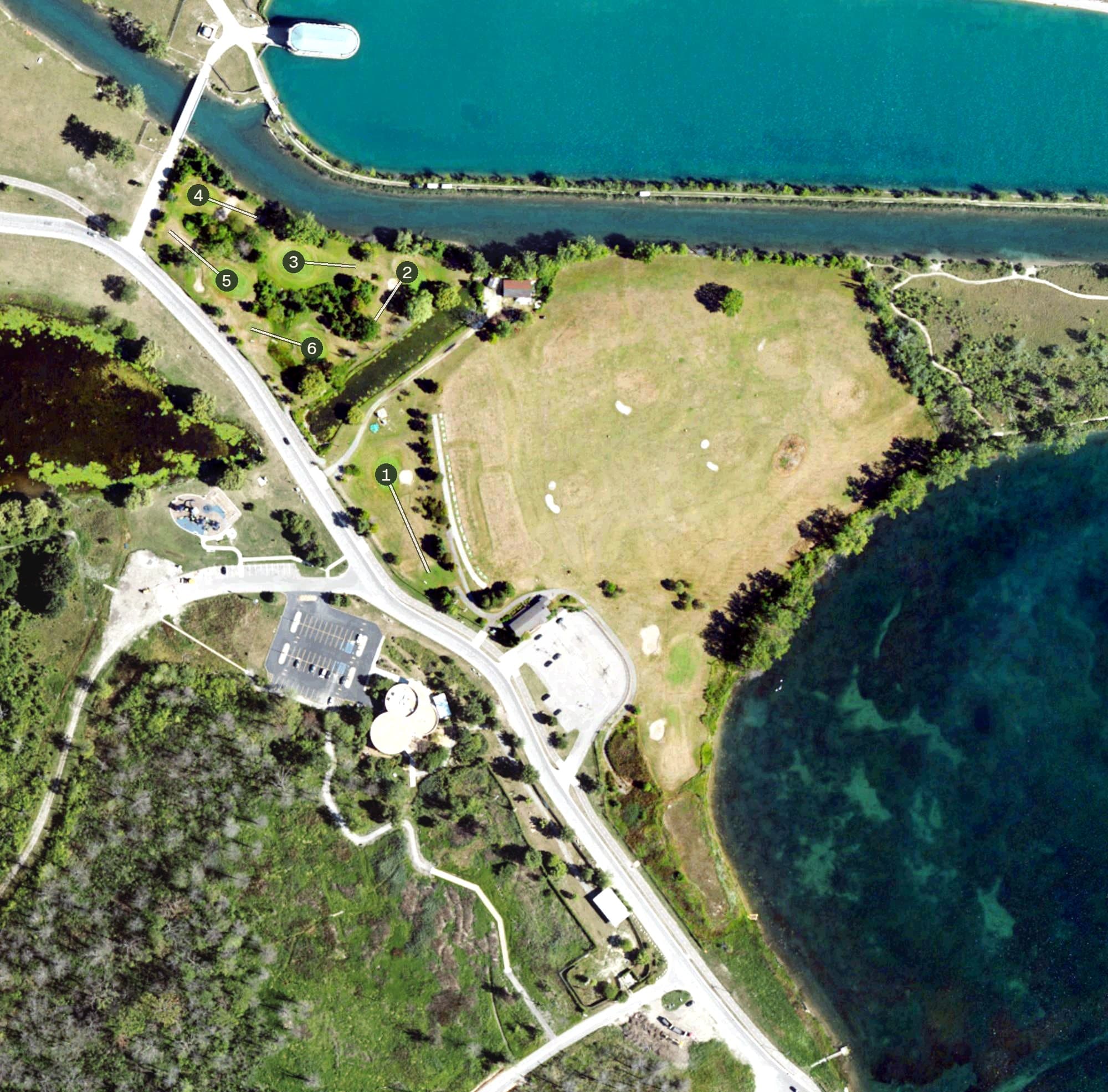 Aerial view of Belle Isle Practice Center, MI, with its hole routing marked