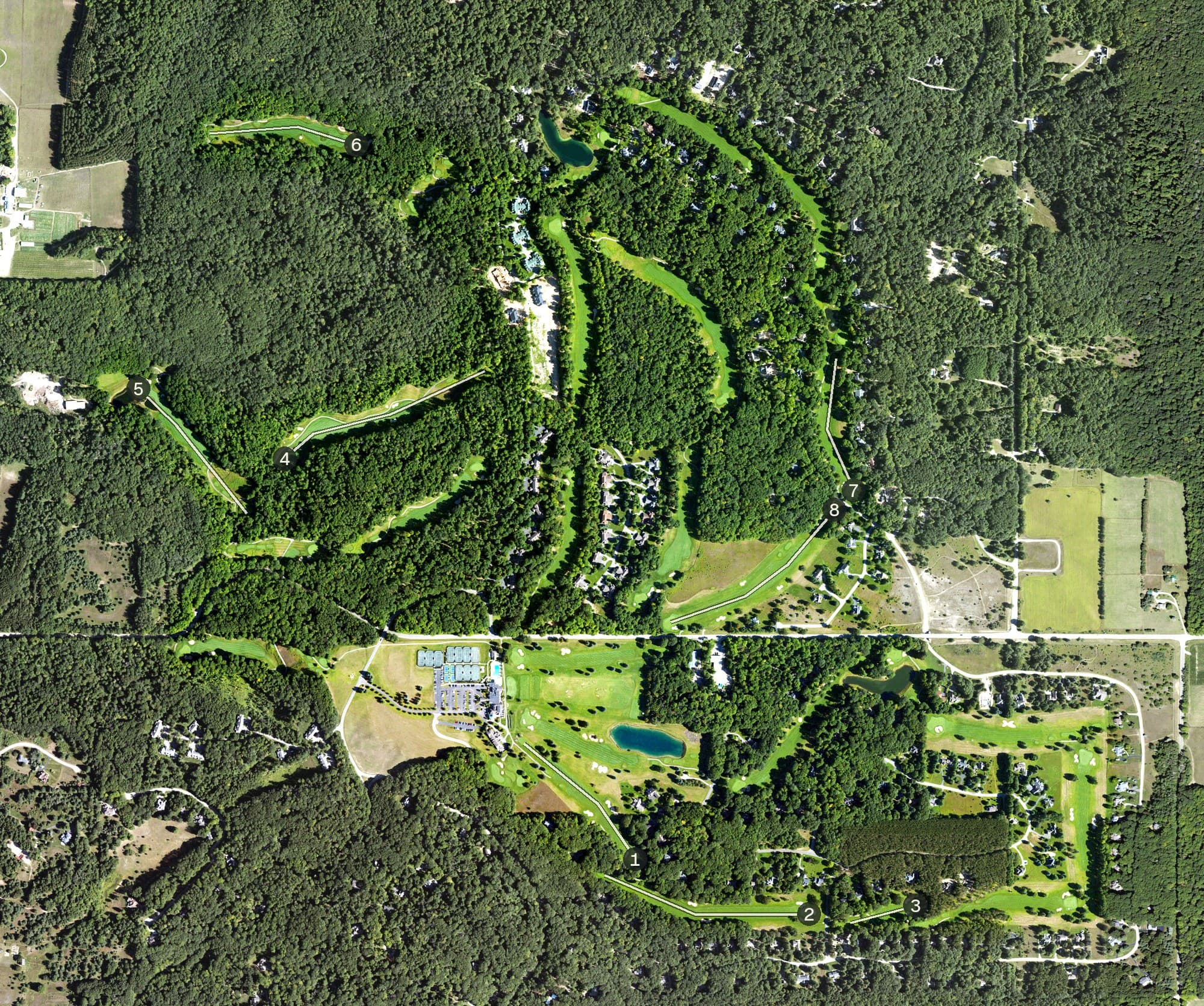 Aerial view of Birchwood Farms Golf & Country Club, MI, with its hole routing marked