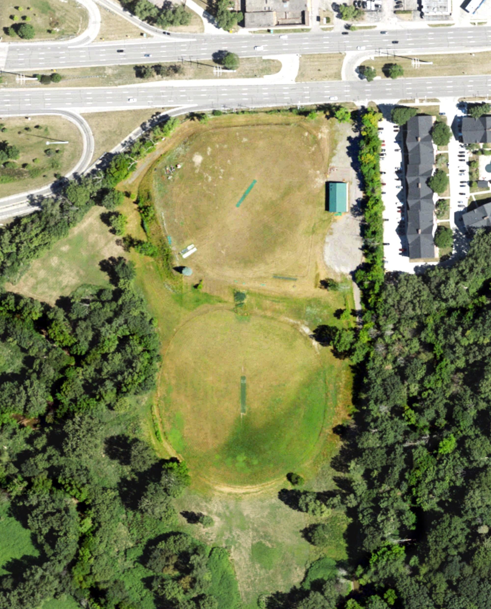 Aerial view of Bonnie Brook Golf Range, MI, with its hole routing marked