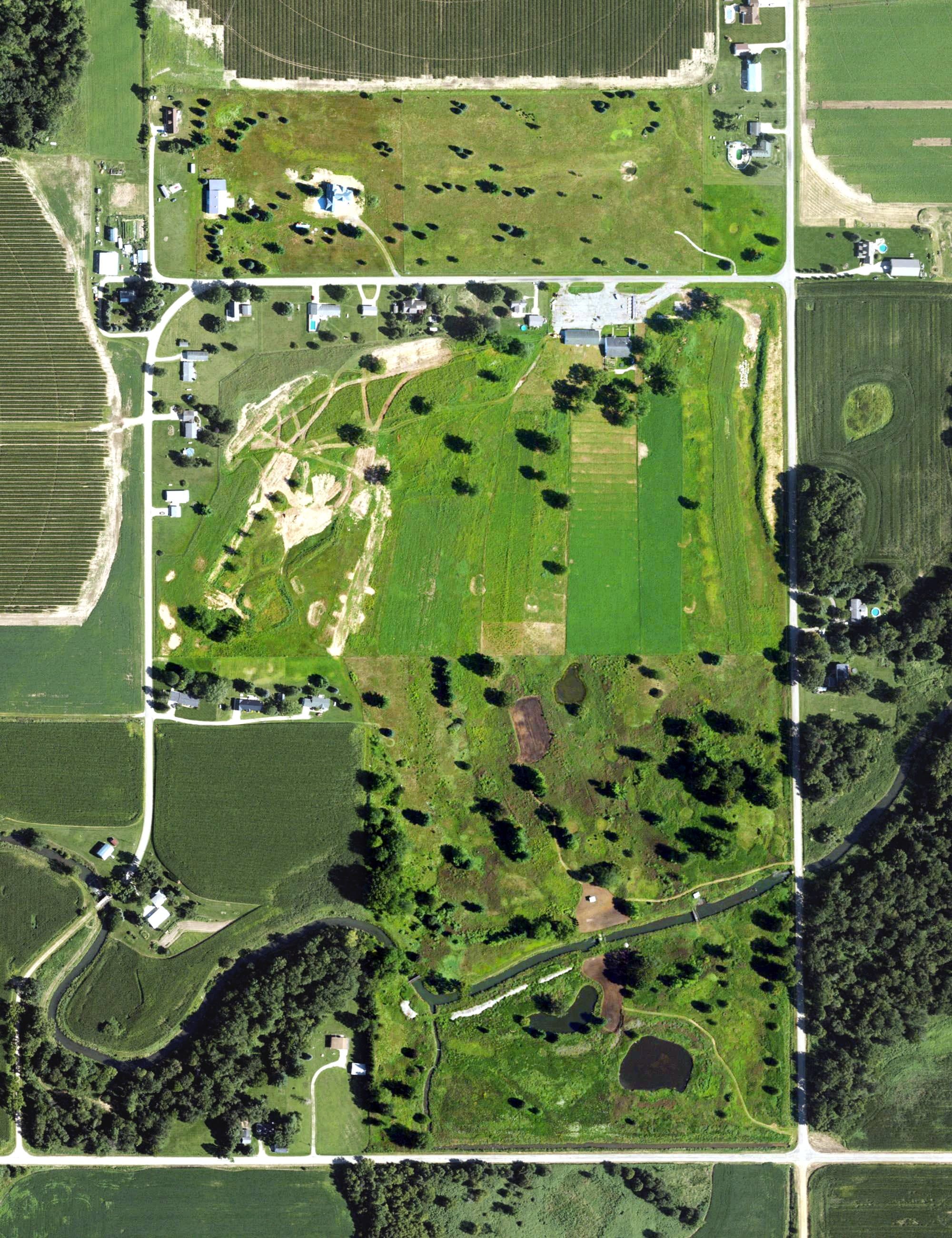 Aerial view of Bronson Golf Club, MI, with its hole routing marked