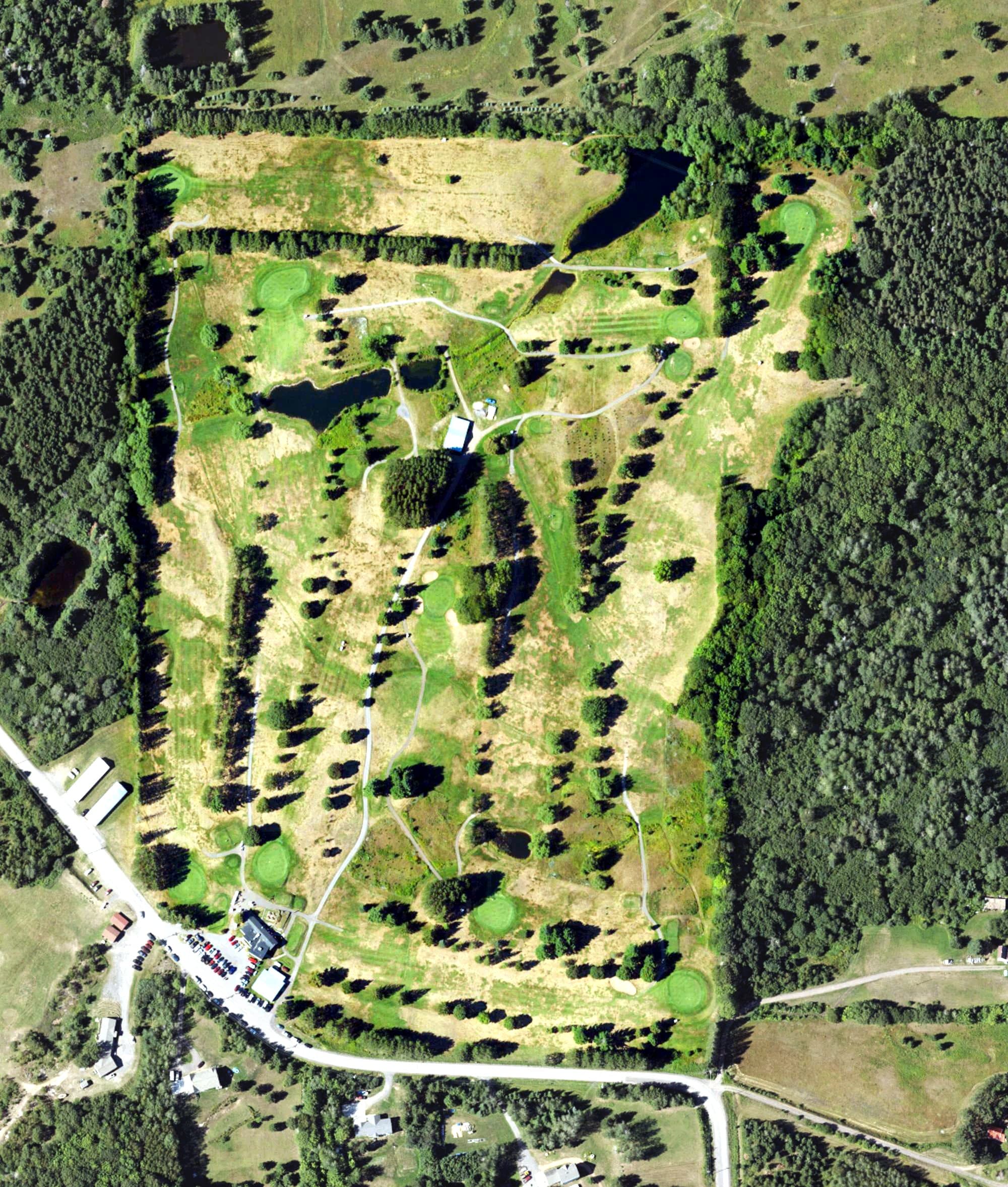 Aerial view of Calumet Golf Club, MI, with its hole routing marked