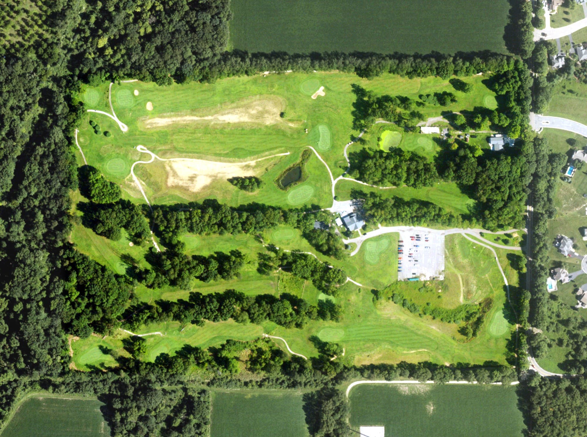 Aerial view of Cedar Farms Golf Club, MI, with its hole routing marked