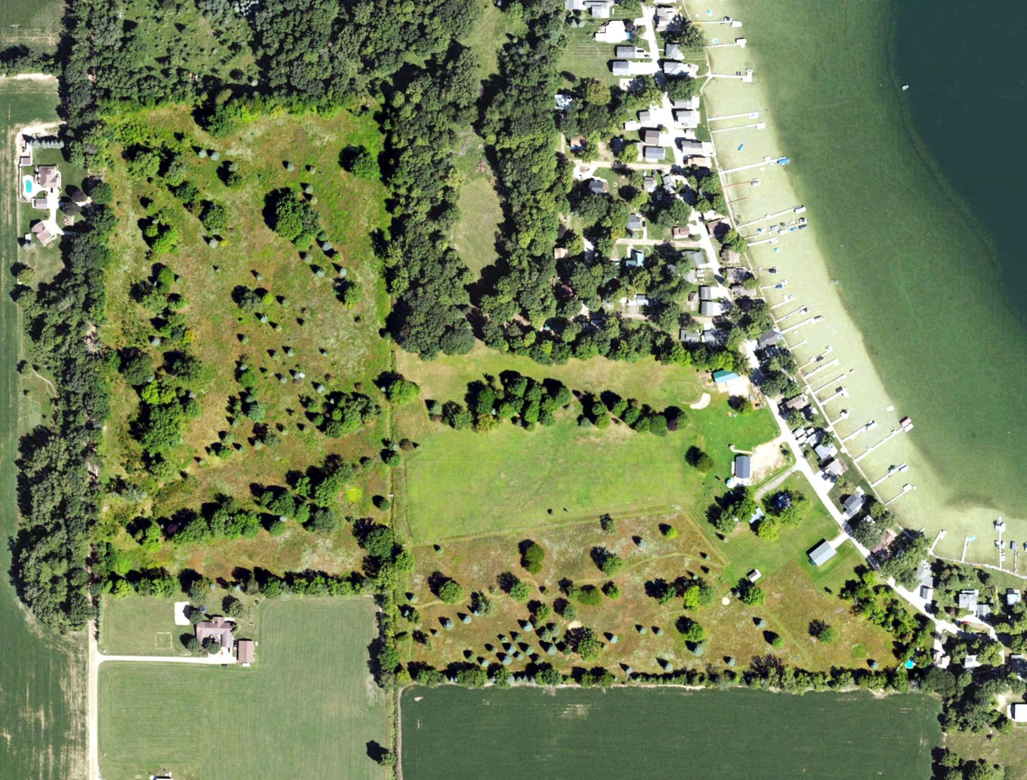 Aerial view of Crystal Golf Course, MI, with its hole routing marked