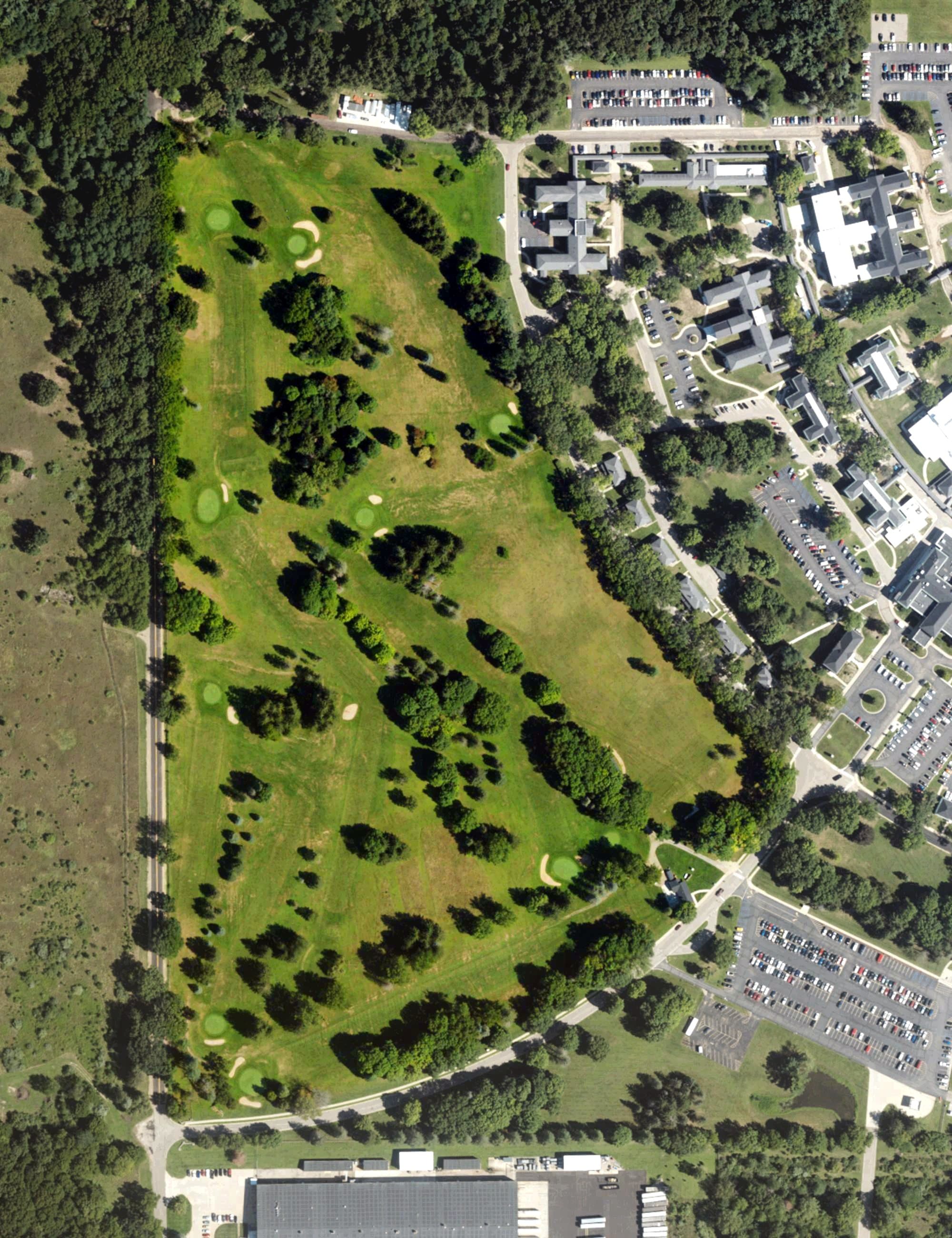 Aerial view of Custer Greens Golf Course, MI, with its hole routing marked