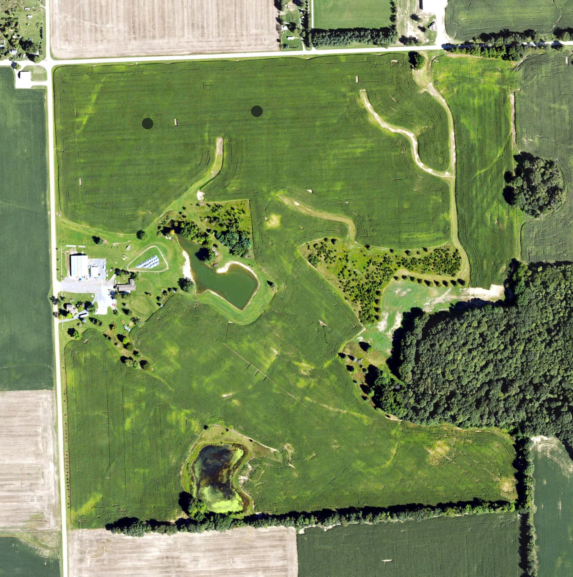 Aerial view of DeMor Hills Golf Course, MI, with its hole routing marked
