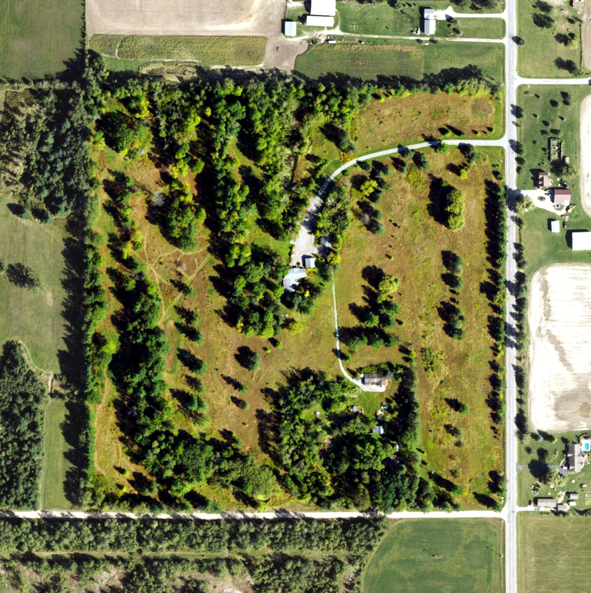 Aerial view of Edgewood Greens Golf Course, MI, with its hole routing marked