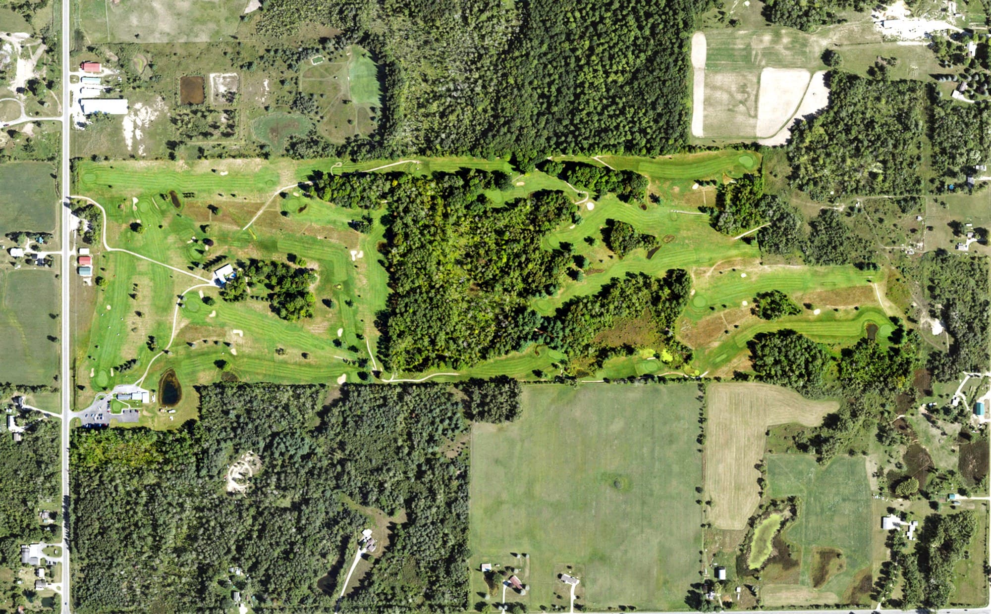 Aerial view of Firefly Golf Links, MI, with its hole routing marked