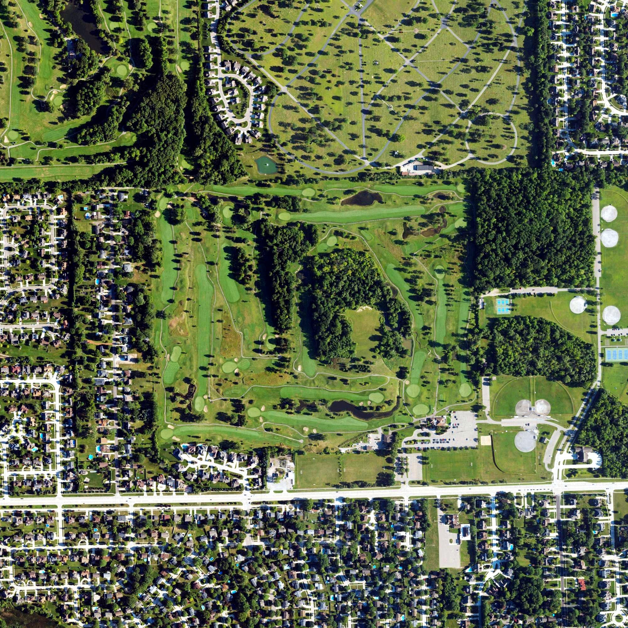 Aerial view of Fox Creek Golf Course, MI, with its hole routing marked