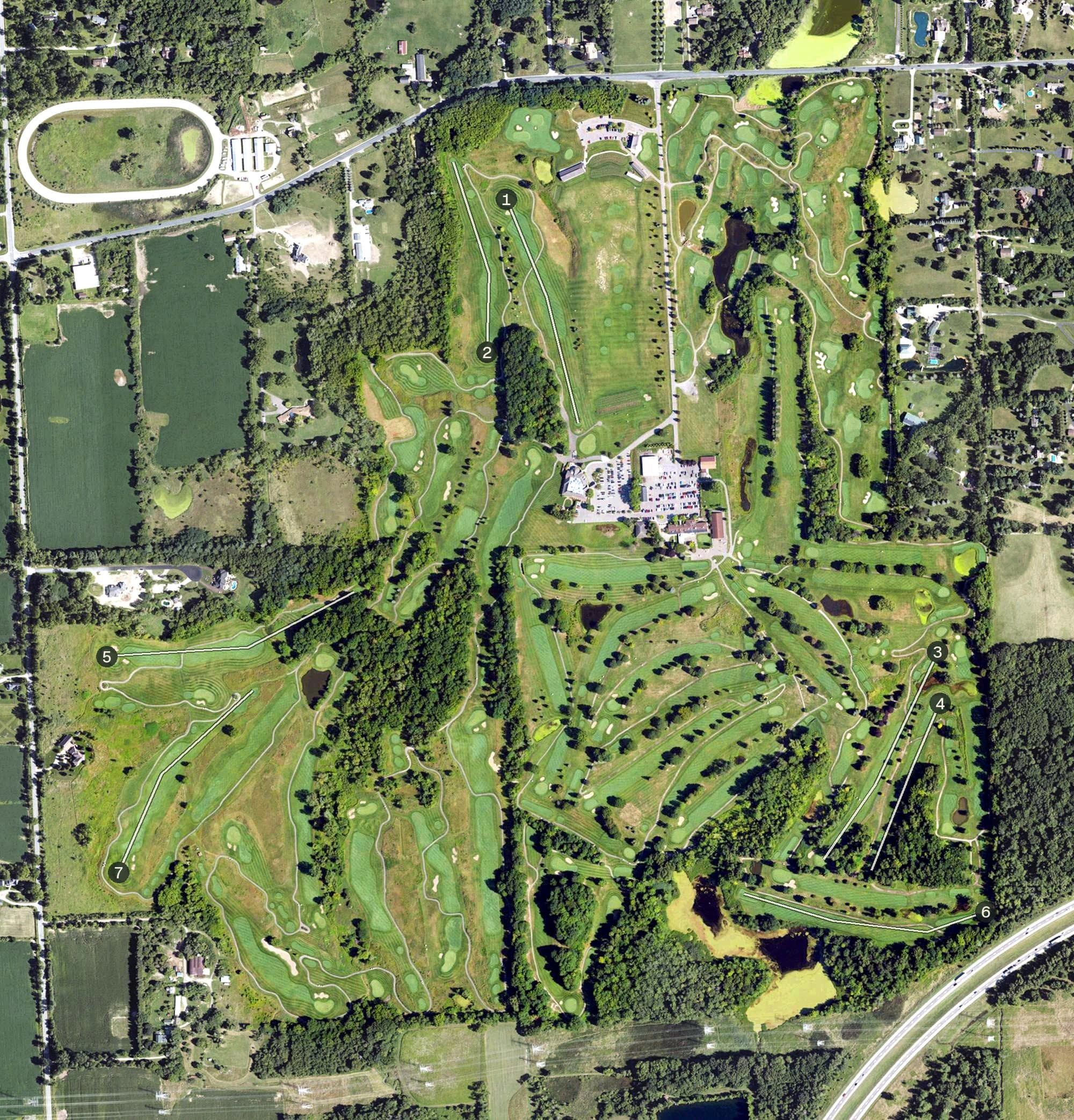 Aerial view of Fox Hills Country Club, MI, with its hole routing marked