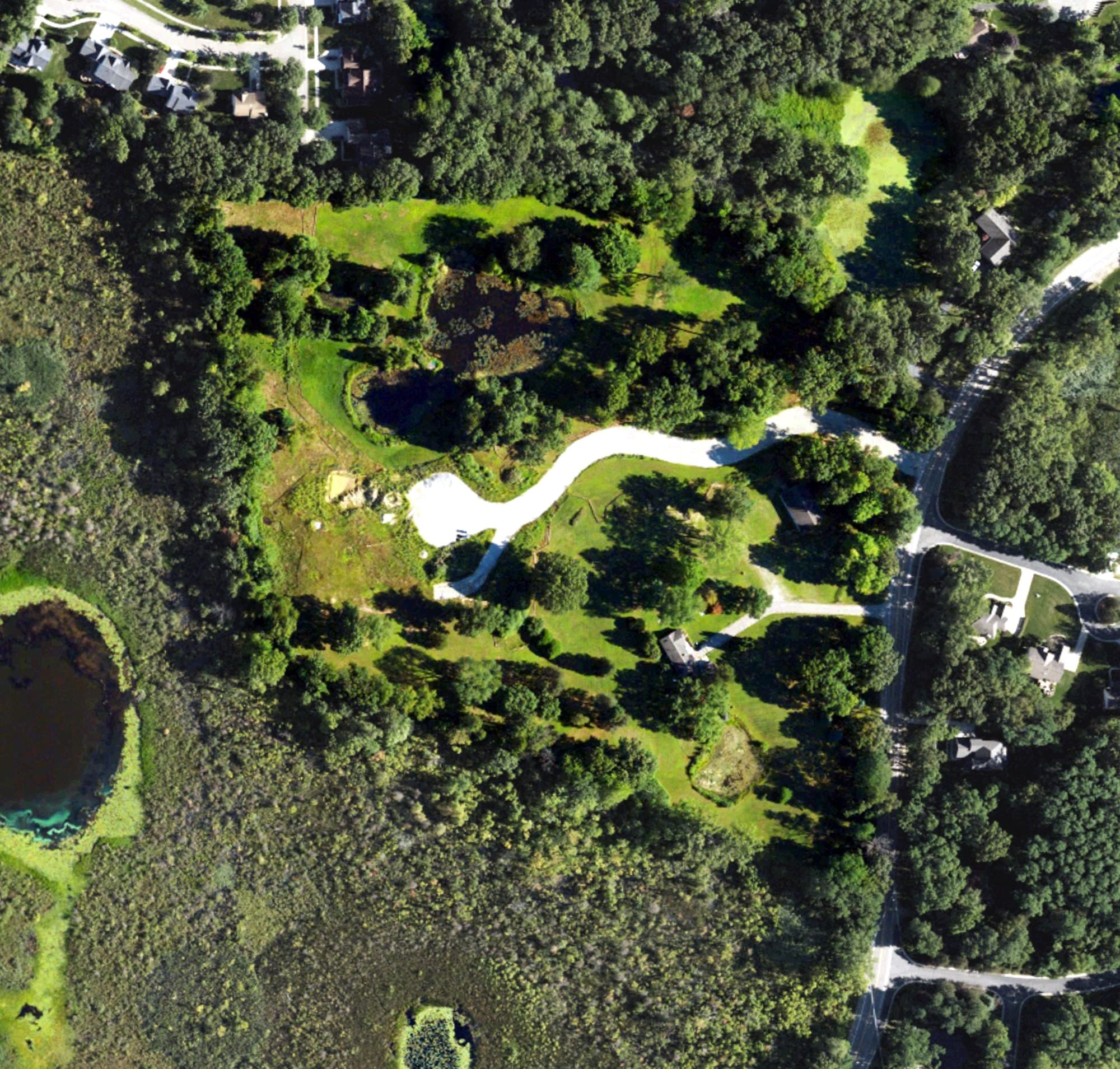 Aerial view of Glenlore Golf Course, MI, with its hole routing marked