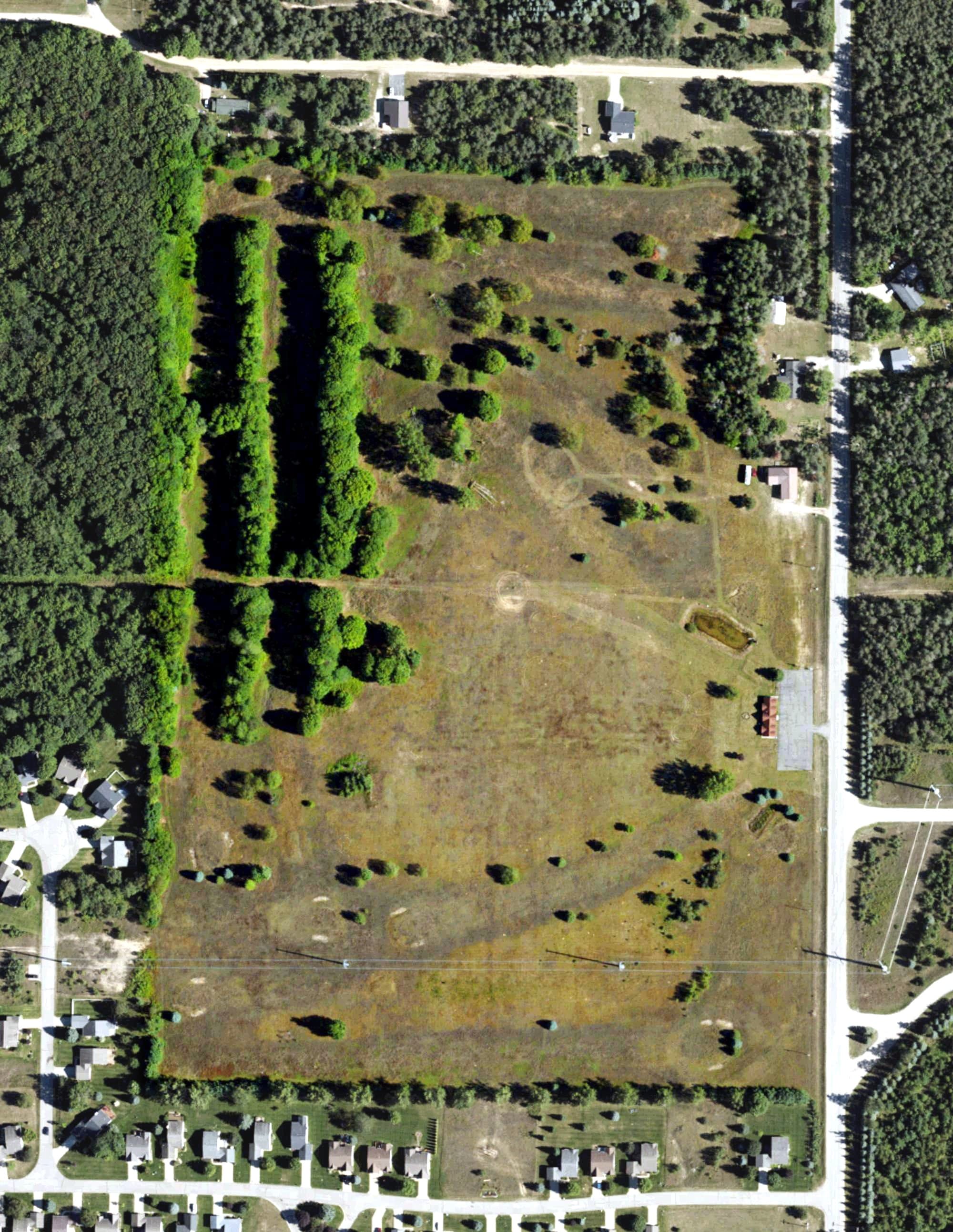 Aerial view of Green Trees Golf Course, MI, with its hole routing marked