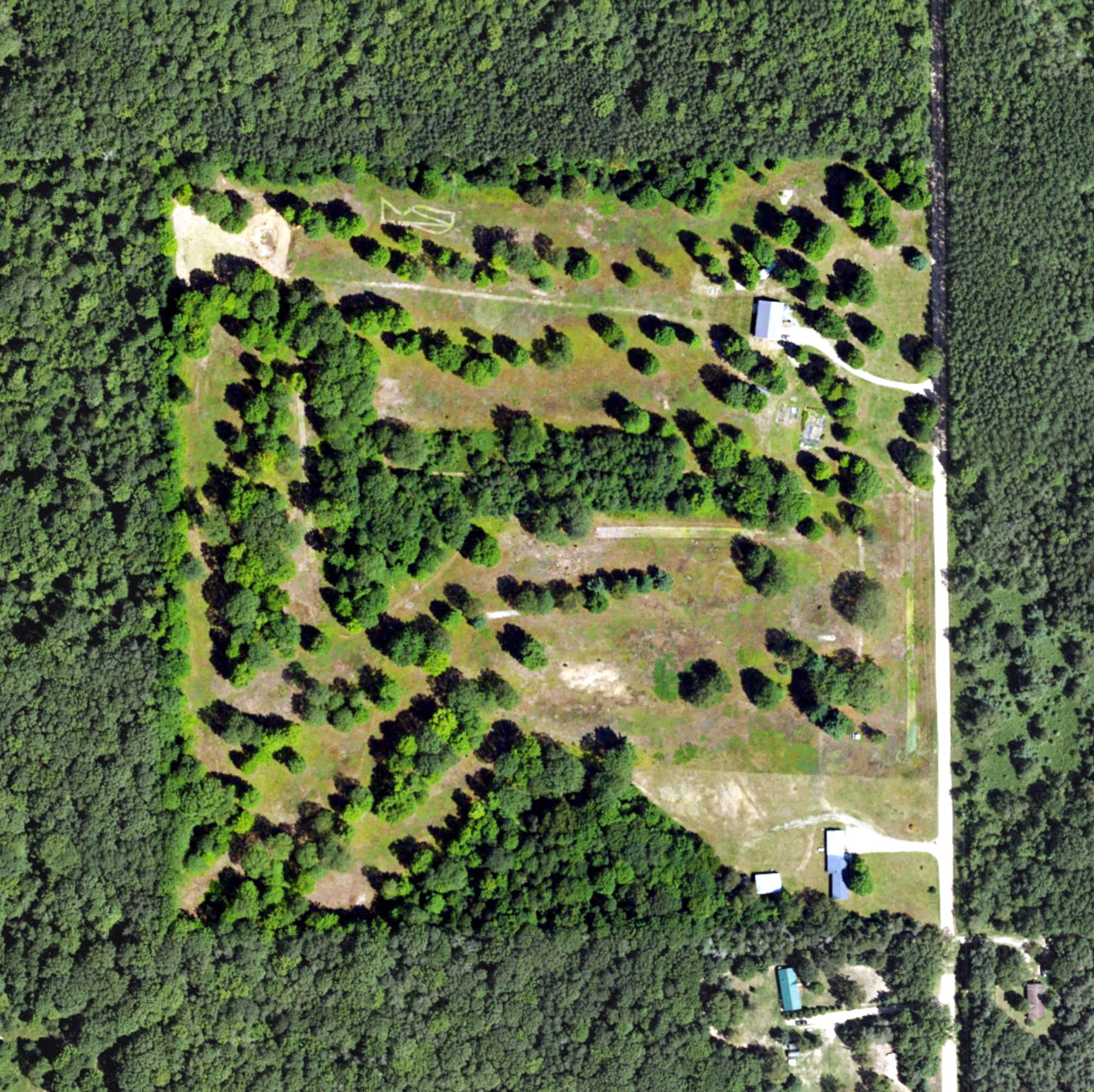 Aerial view of Hawk Golf Course, MI, with its hole routing marked