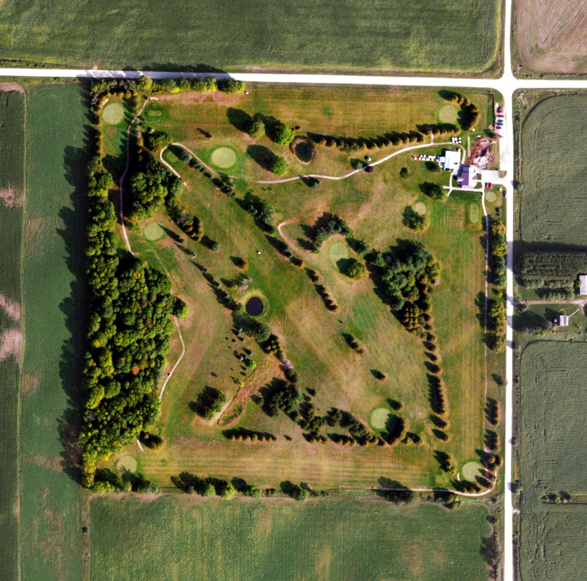 Aerial view of Indian Hills Golf Course, MI, with its hole routing marked