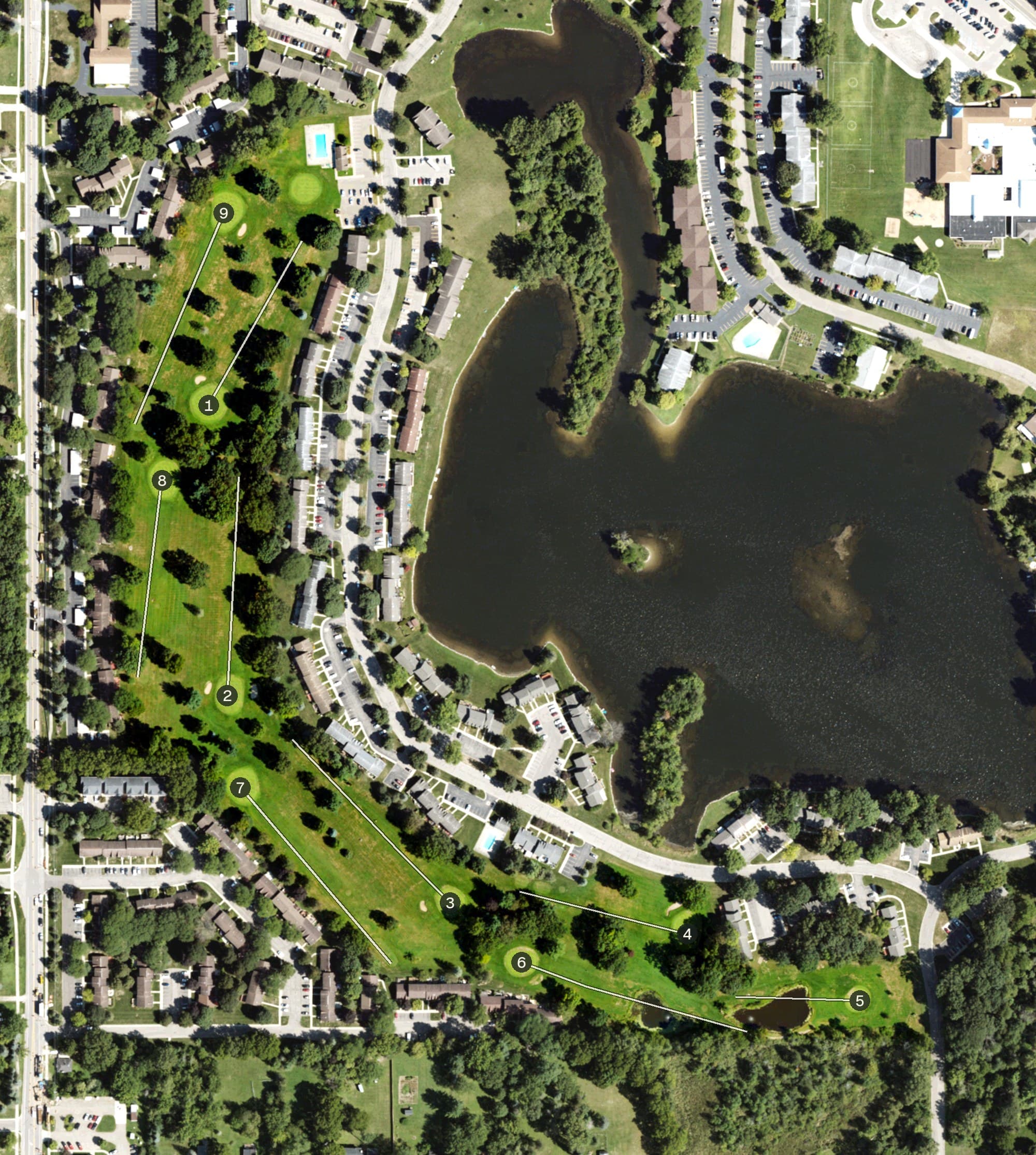 Aerial view of Lake o' the Hills Golf Course, MI, with its hole routing marked