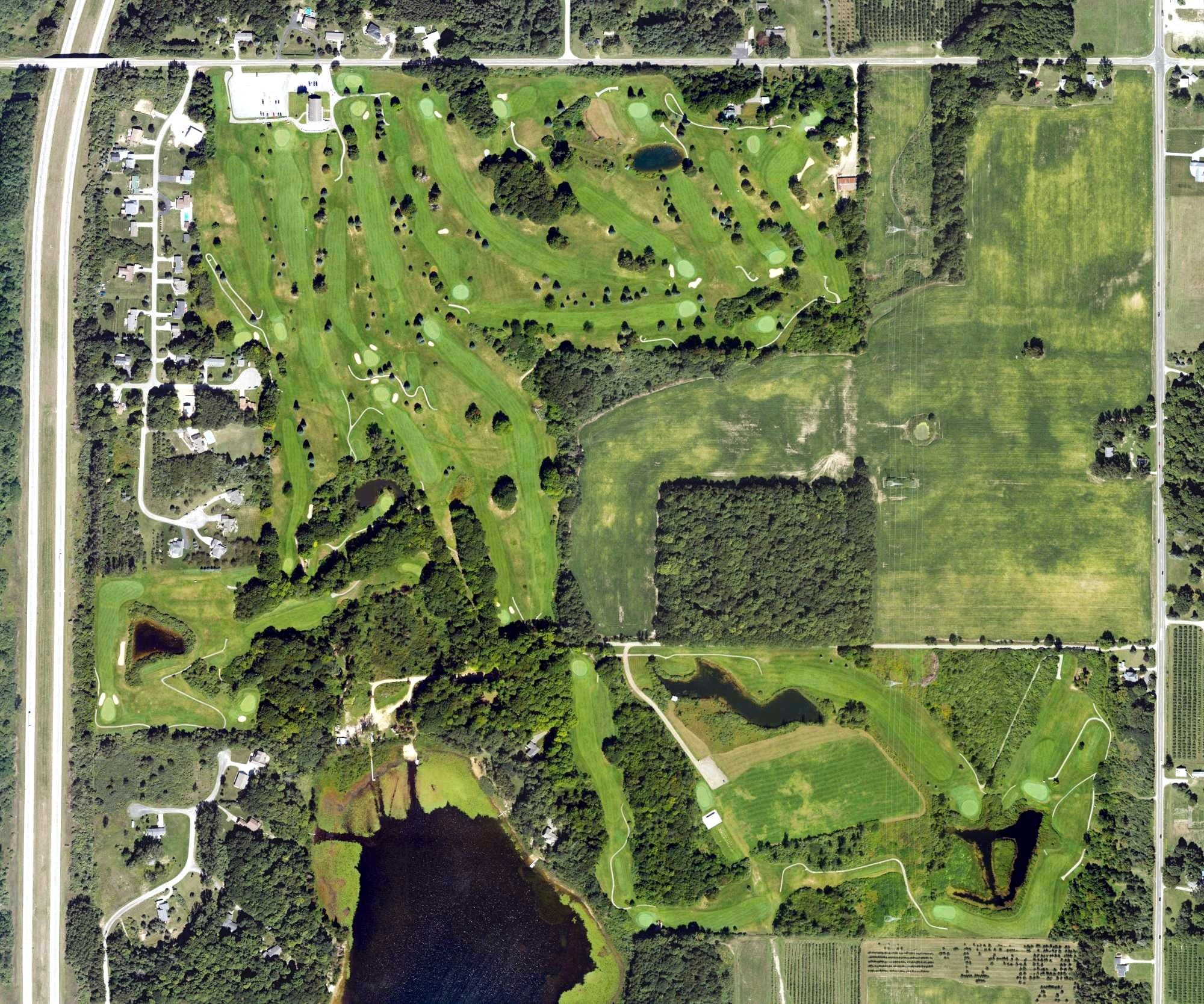 Aerial view of Lakeside Links, MI, with its hole routing marked