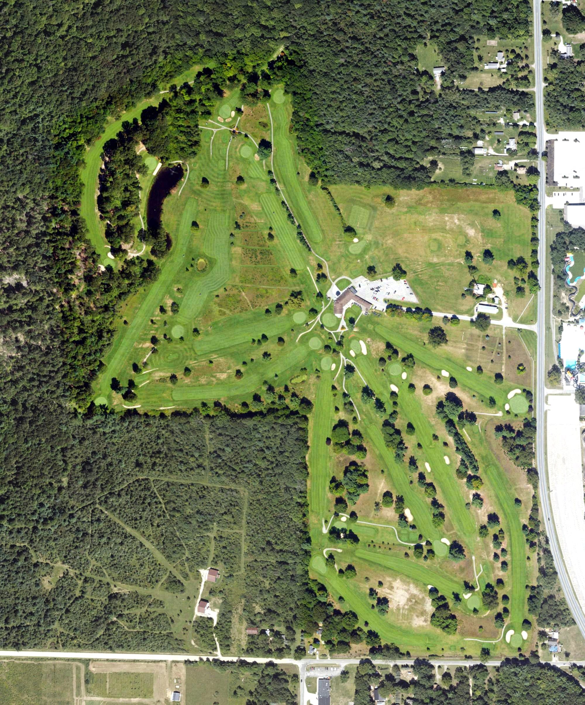 Aerial view of Lincoln Golf Course, MI, with its hole routing marked