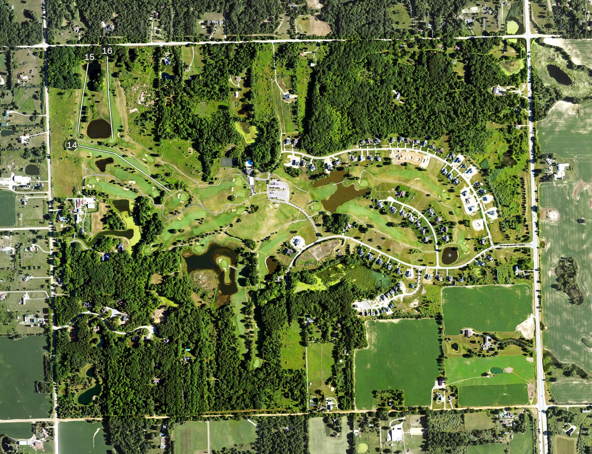 Aerial view of Metamora Country Club, MI, with its hole routing marked