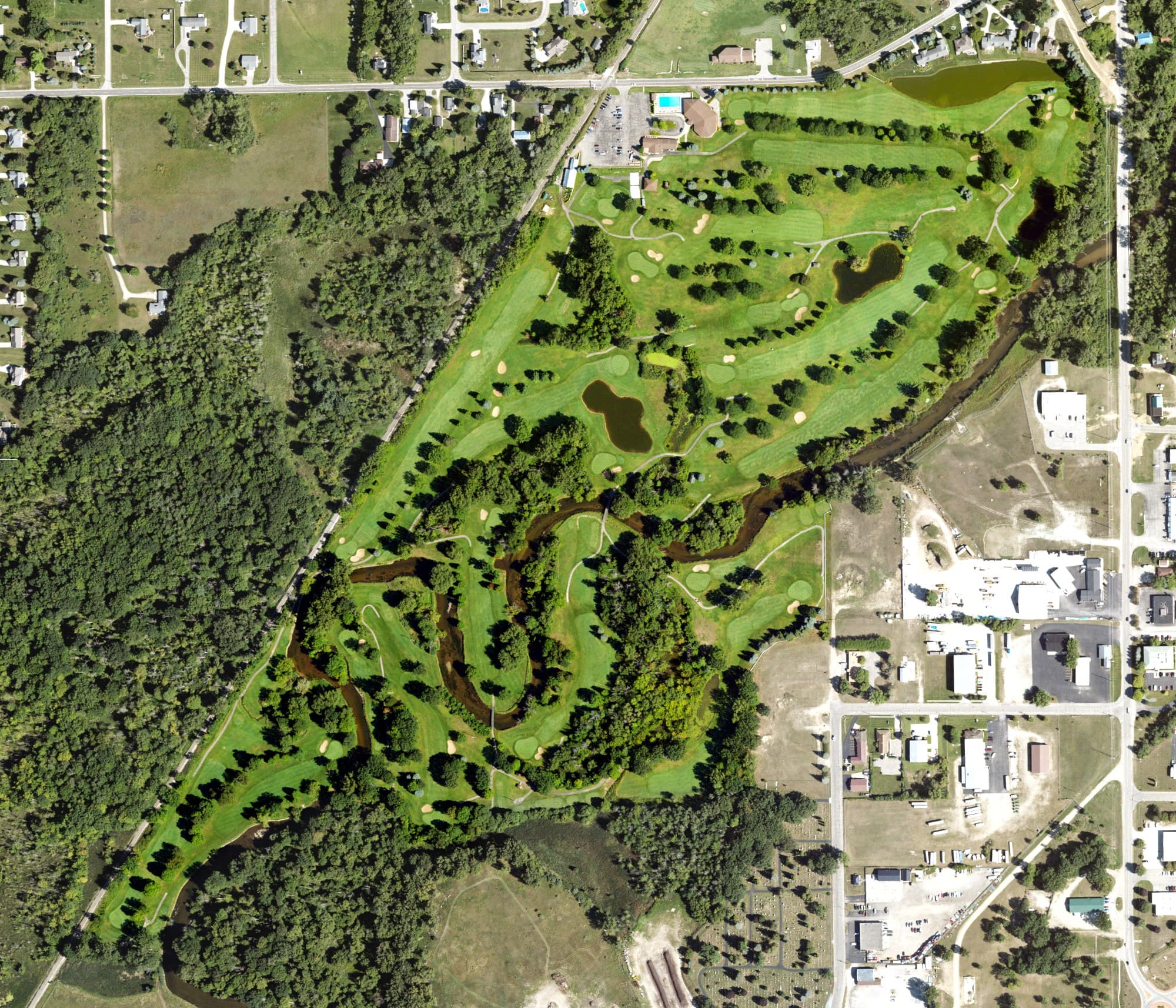 Aerial view of Mount Pleasant Country Club, MI, with its hole routing marked