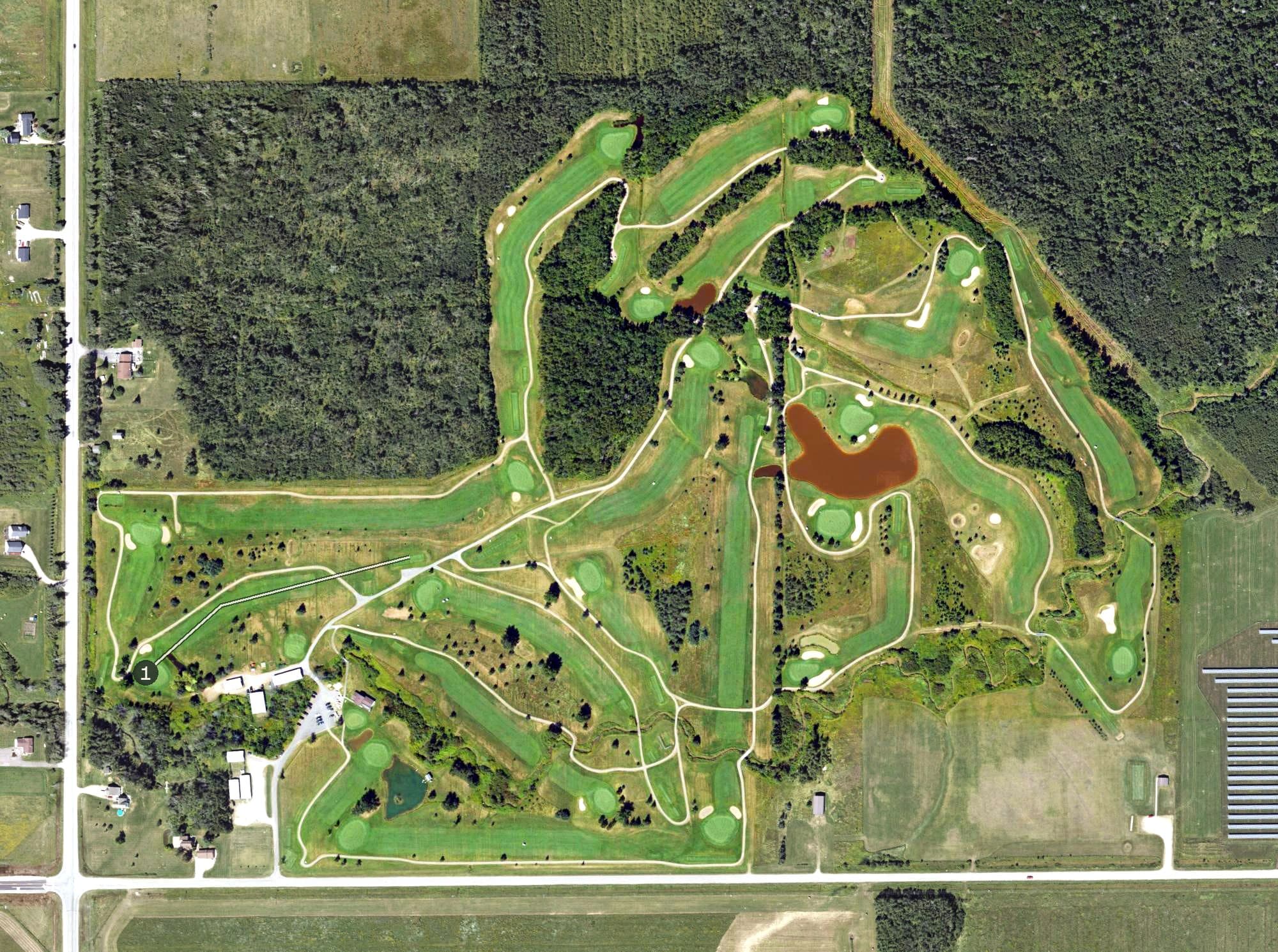 Aerial view of Munoscong Golf Club, MI, with its hole routing marked