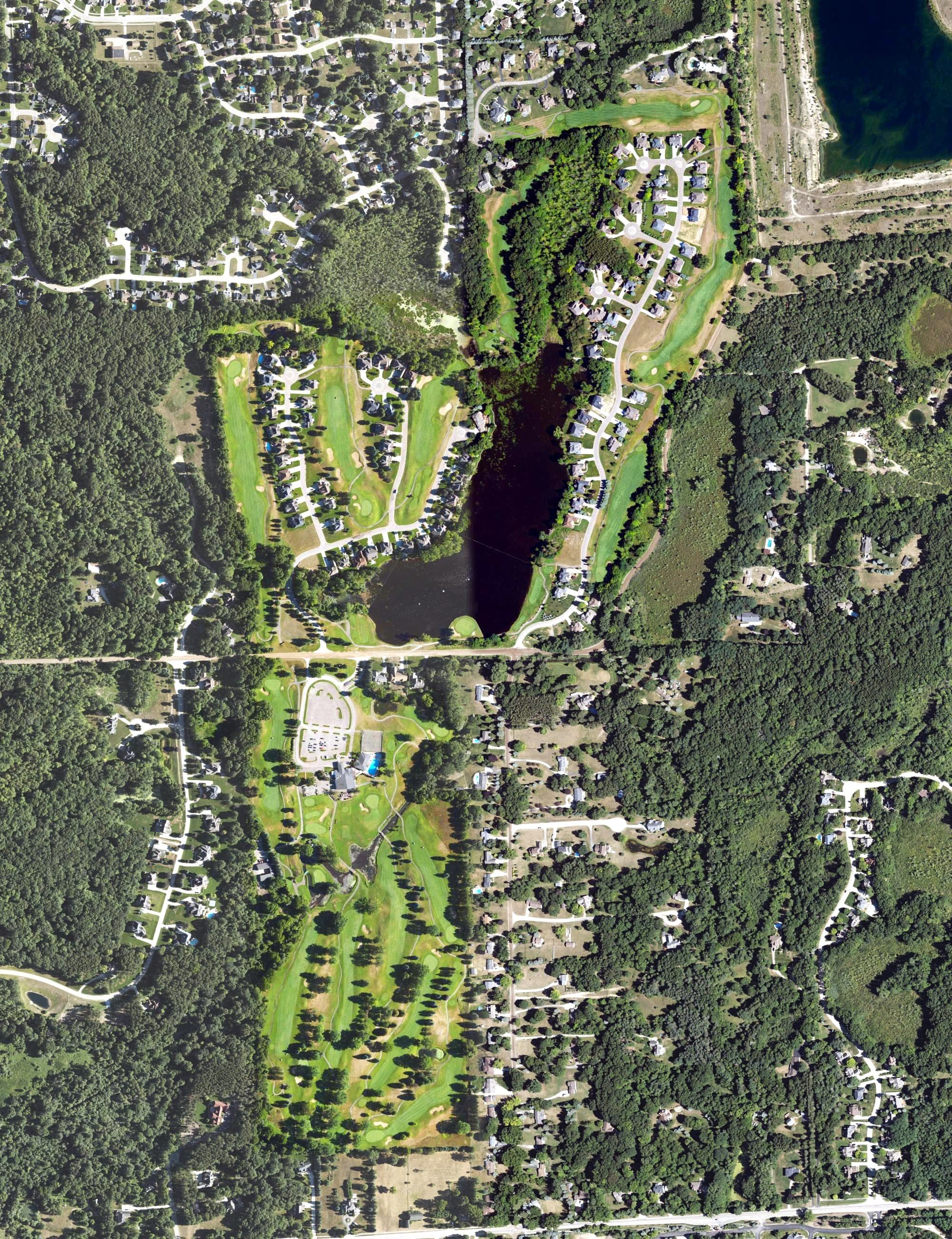 Aerial view of Paint Creek Country Club, MI, with its hole routing marked