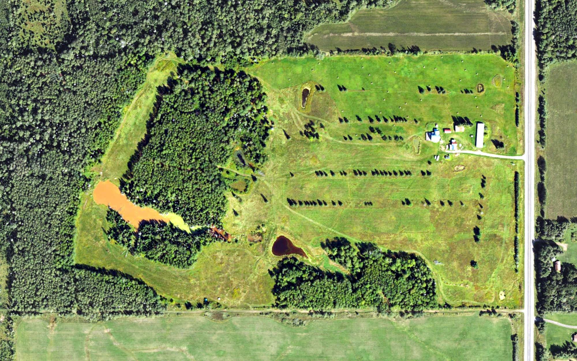 Aerial view of Perttu's Big Spruce Golf Course, MI, with its hole routing marked
