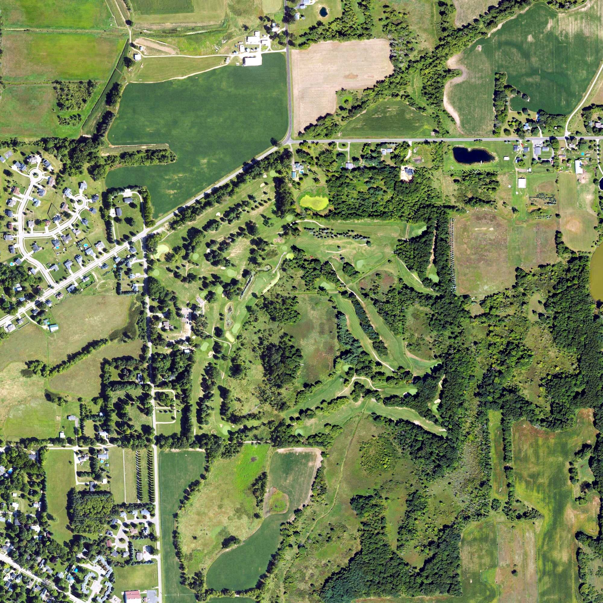 Aerial view of Pine Hills Golf Course, MI, with its hole routing marked