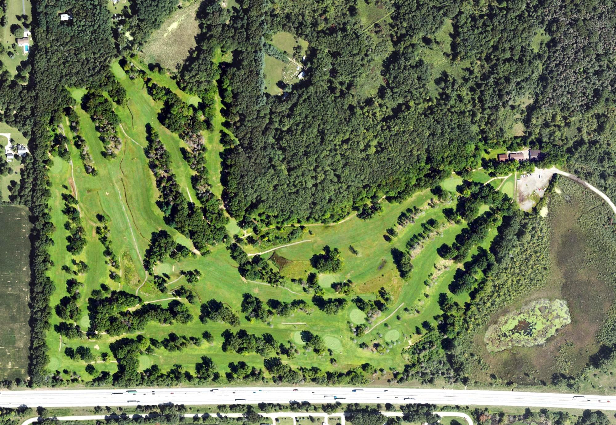 Aerial view of Pine Hollow Golf Club, MI, with its hole routing marked