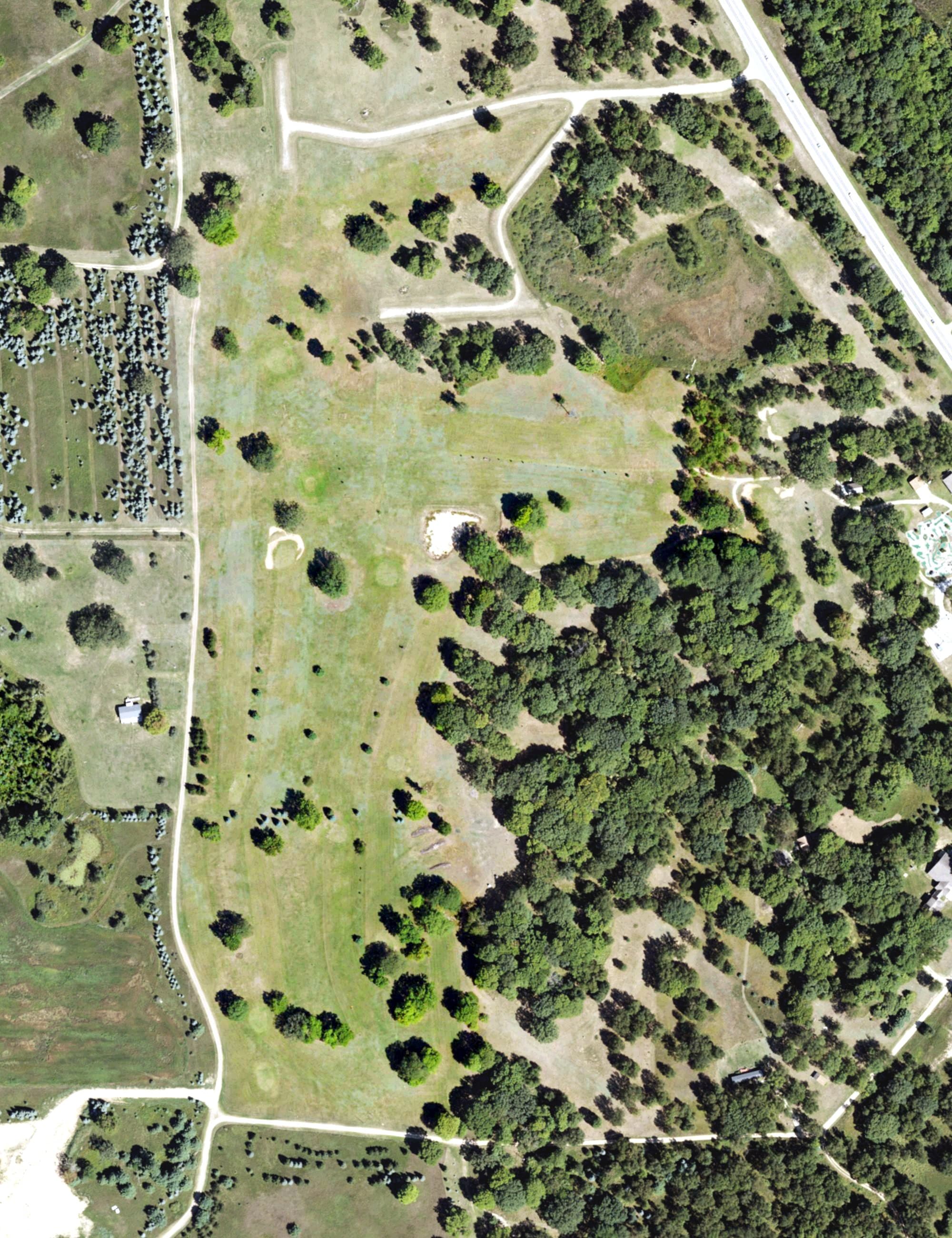 Aerial view of Pleasant Meadows, MI, with its hole routing marked