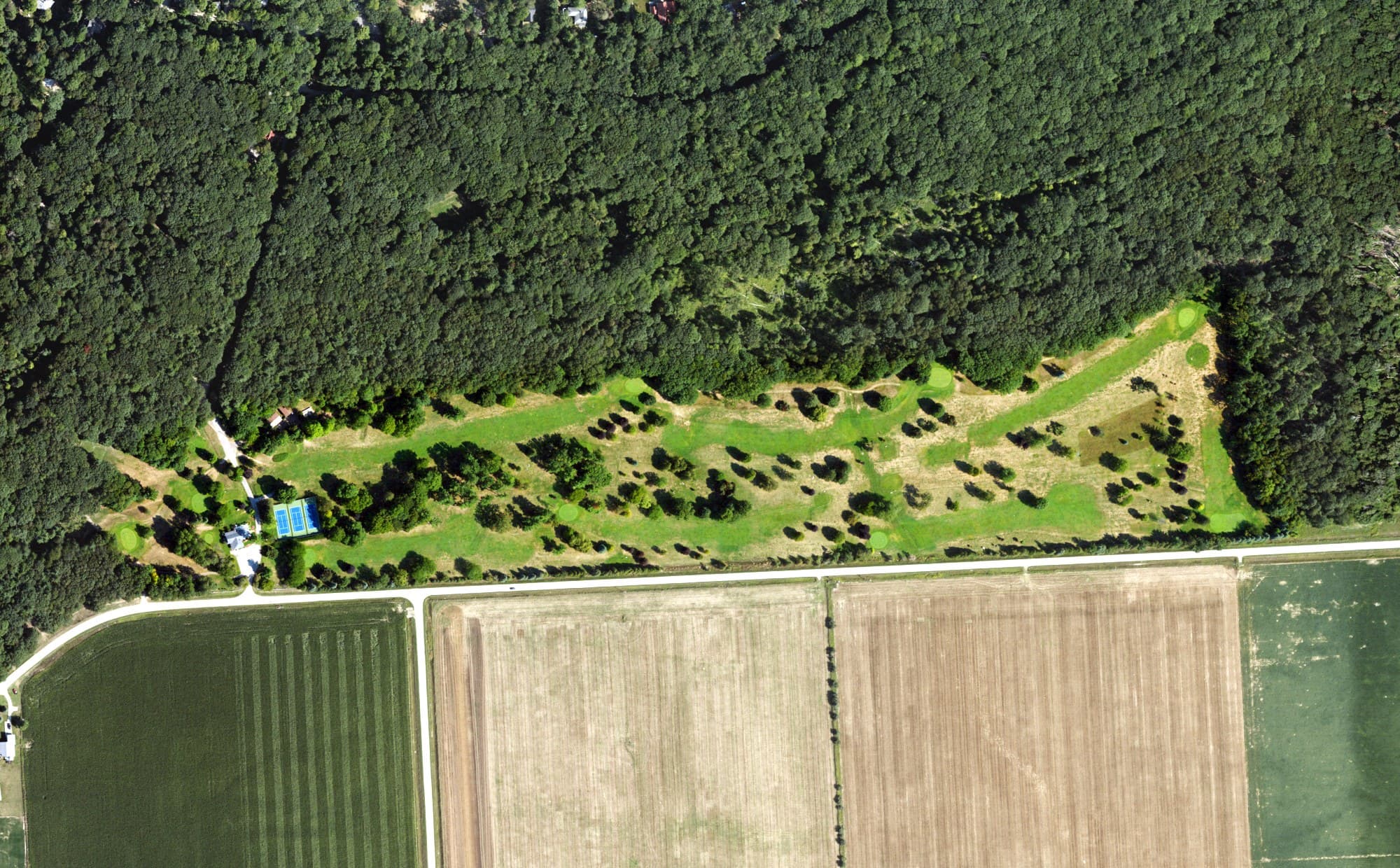 Aerial view of Pointe Aux Barques Golf Course, MI, with its hole routing marked