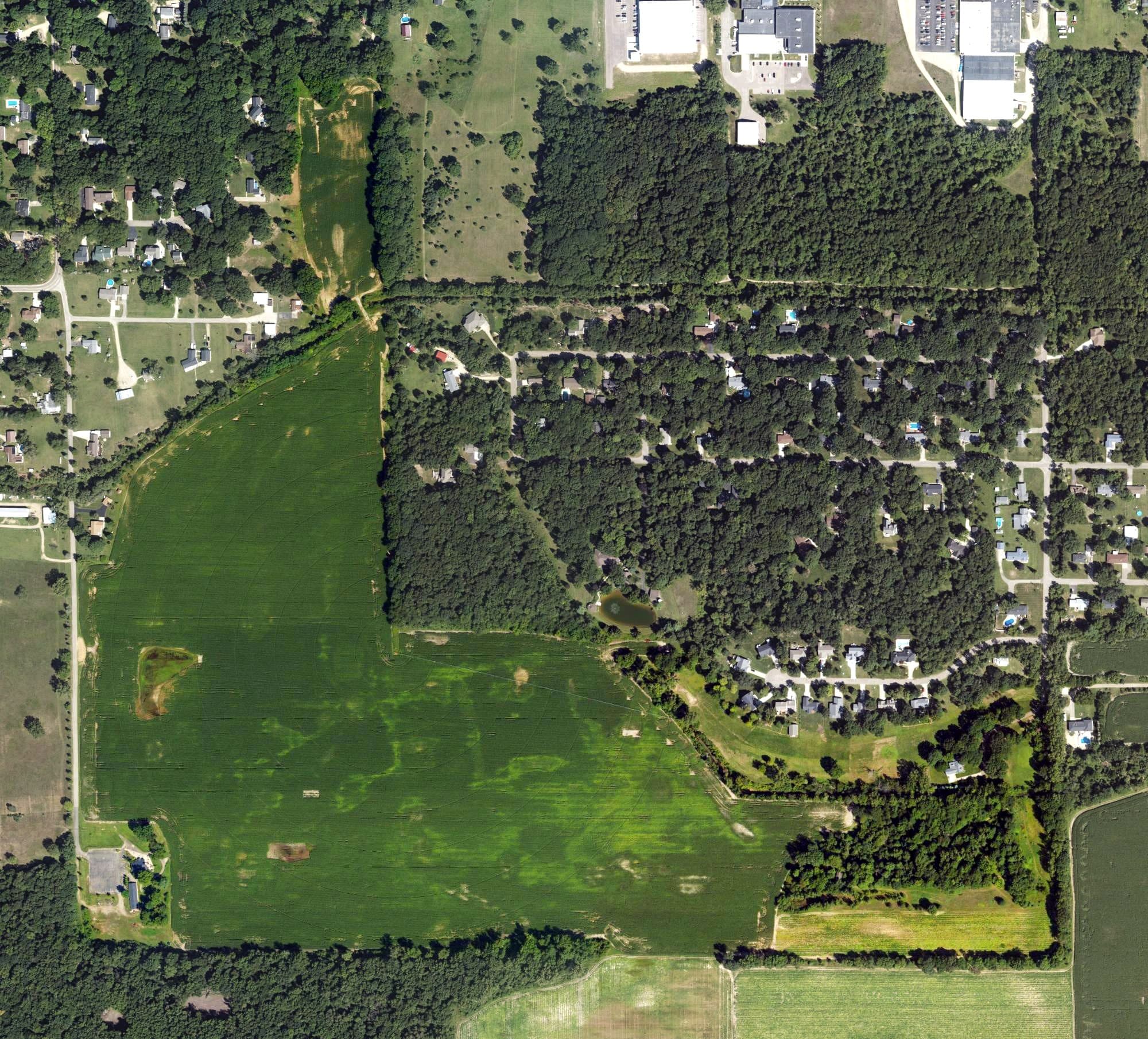 Aerial view of Prairiewood Golf Course, MI, with its hole routing marked