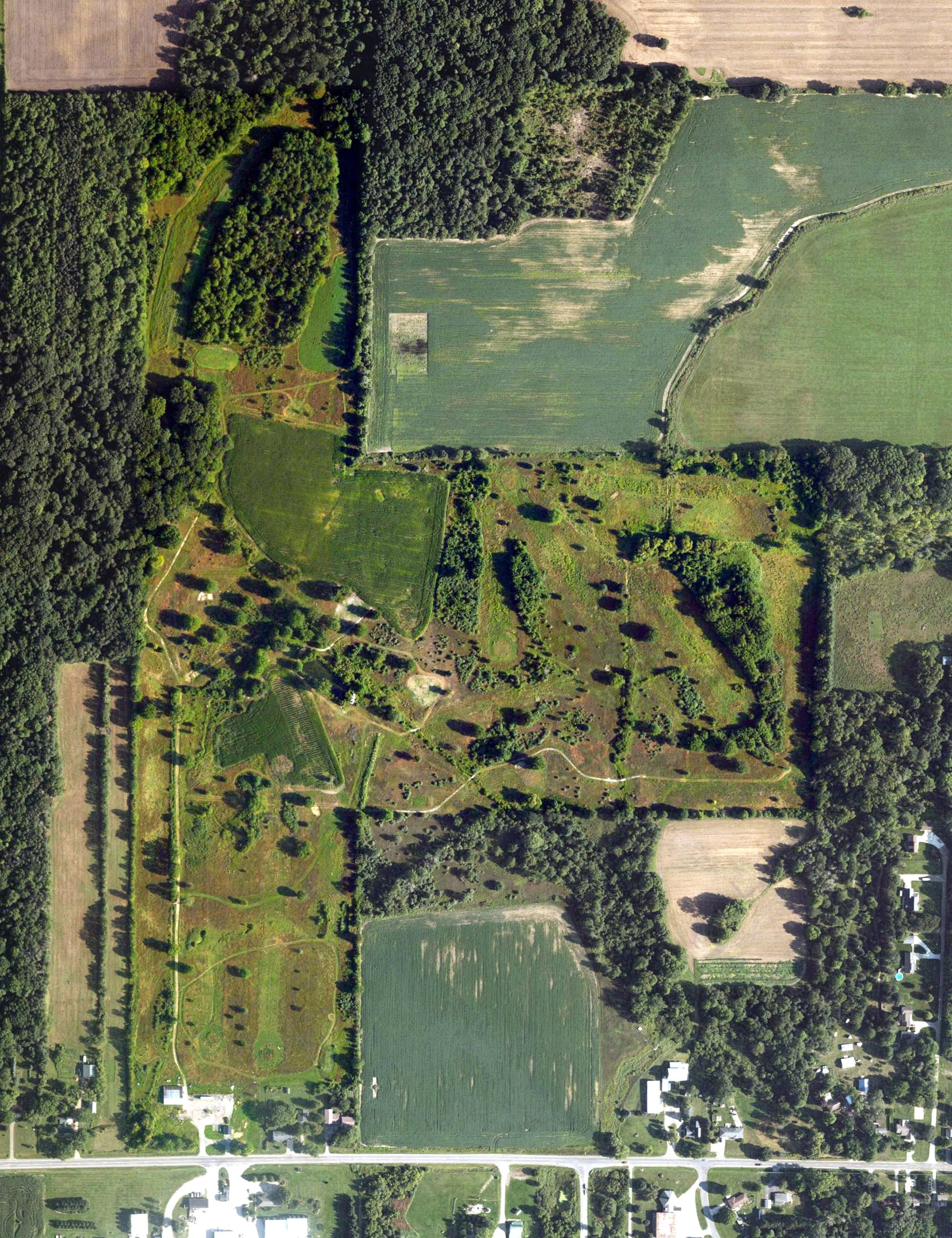 Aerial view of Ravenna Creeks Golf Course, MI, with its hole routing marked