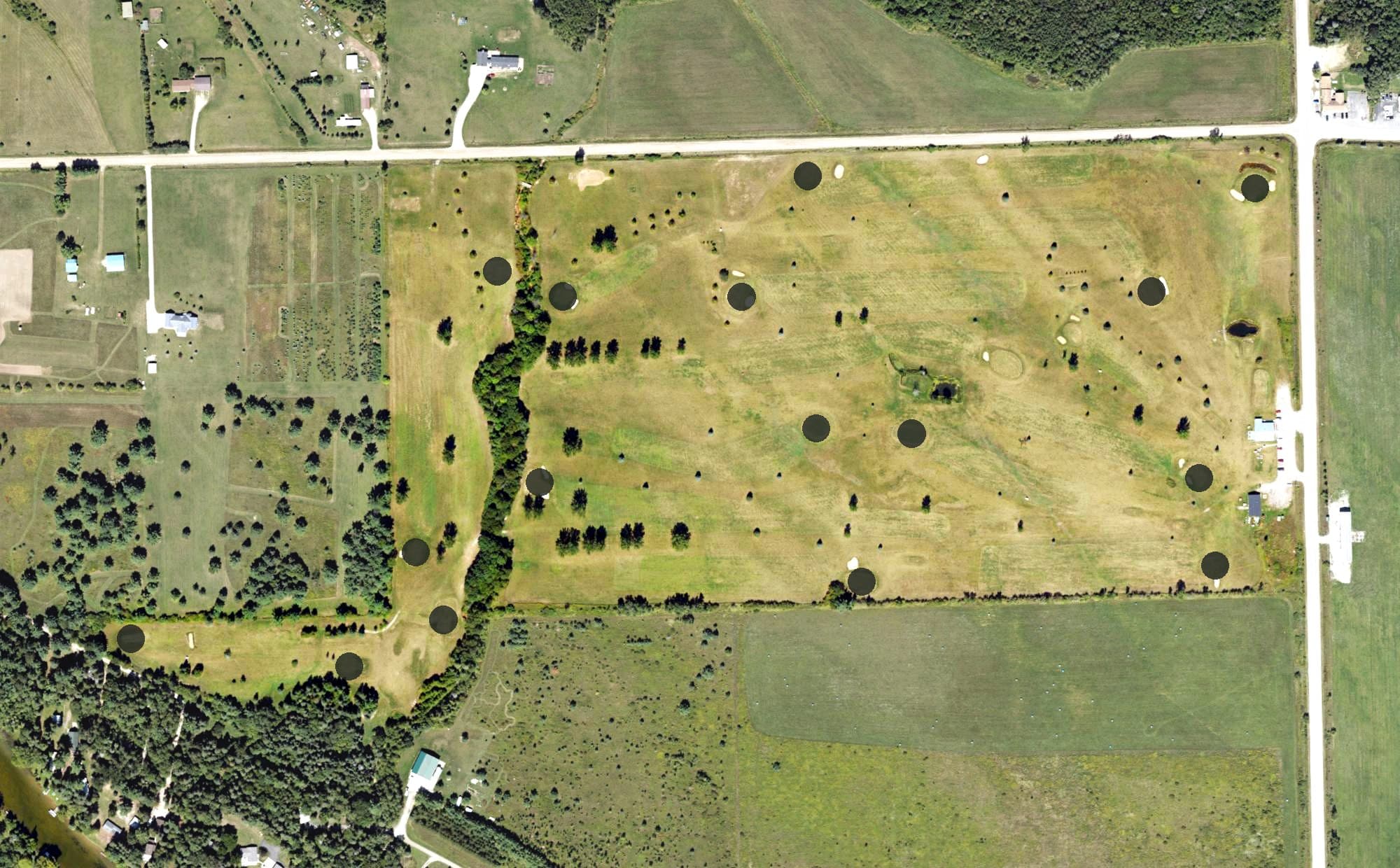 Aerial view of Rippling Rapids Golf Club, MI, with its hole routing marked