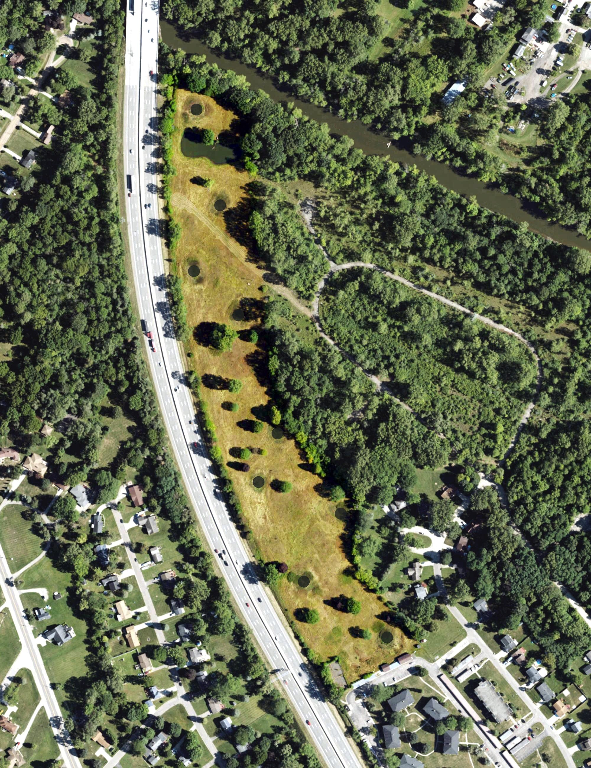 Aerial view of River Forest Golf Course, MI, with its hole routing marked