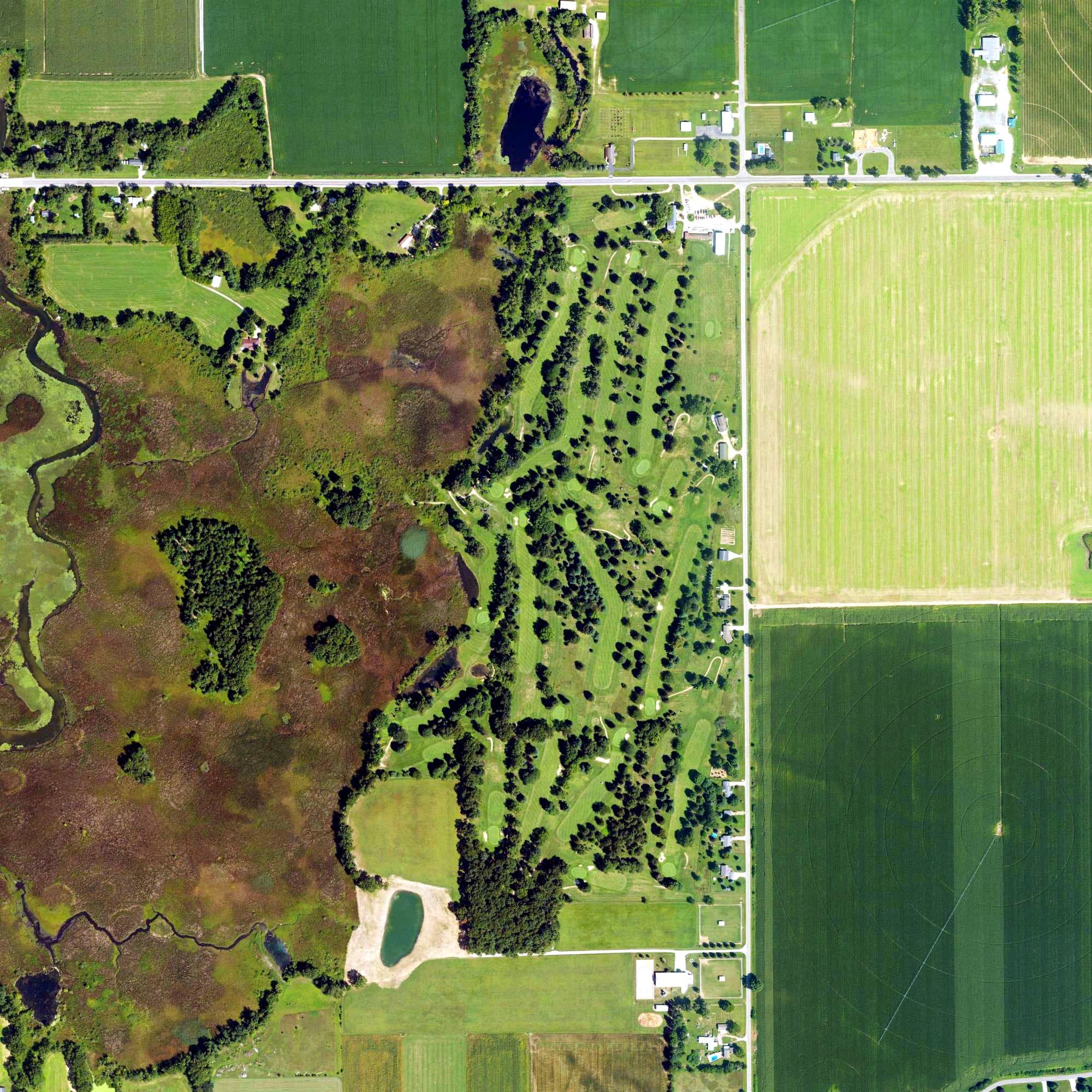 Aerial view of Saint Joe Valley Golf Course, MI, with its hole routing marked