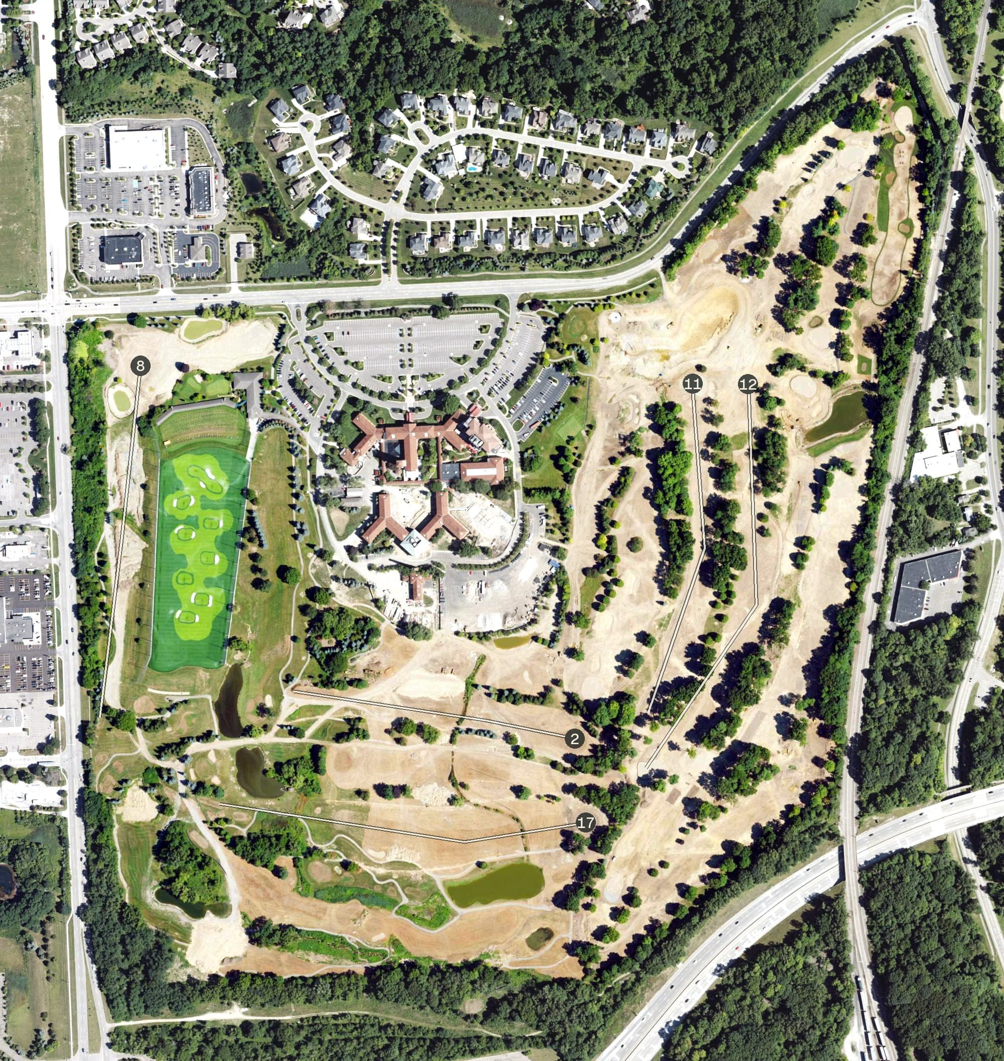 Aerial view of Saint John's Resort Golf Course, MI, with its hole routing marked